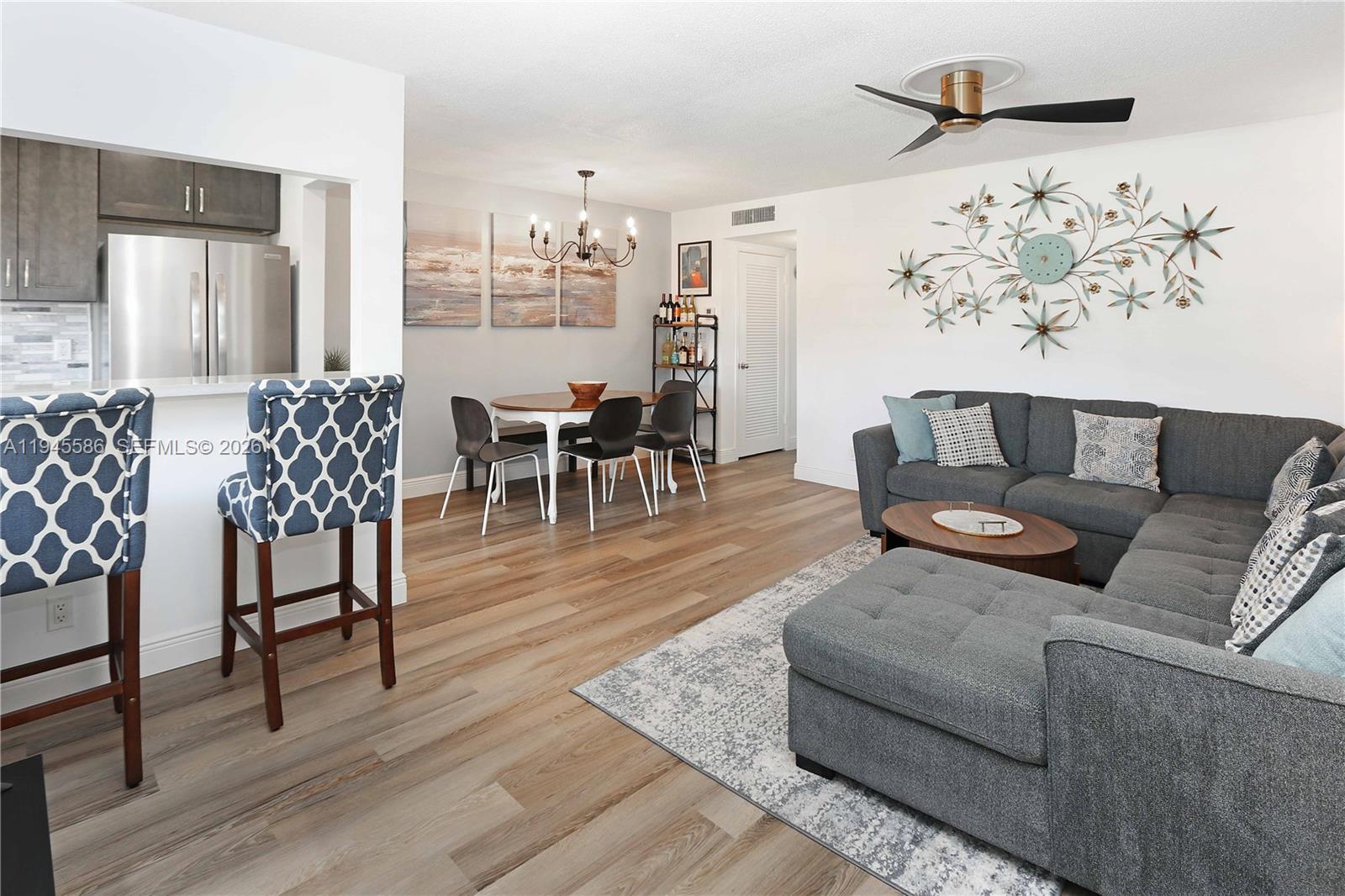 Situated in a vibrant 55+, gated community, this beautiful 1-bedroom, 1 bathroom condo blends comfort, style, and updates throughout. The heart of the home is the beautifully updated kitchen, featuring furniture-grade cabinetry, sleek quartz countertops, and a full suite of stainless steel appliances, including a microwave, range, and French door refrigerator with an auto ice maker. 
The open living and dining area is designed to feel both cozy and functional. It comes furnished with a large pop-up sleeper sofa offering built-in storage, making it ideal for hosting guests. A modern,  overhead fan adds comfort, while an elegant chandelier provides a touch of sophistication. Outside, you'll find the perfect seating area, on the spacious screened porch, to enjoy early mornings and evenings. Community Amenities include a pool, gym, shuffleboard, library, clubhouse w/ bingo nights, & an outdoor dining area.
Whether you’re looking for a charming full-time residence or a stylish retreat, this thoughtfully appointed condo offers comfort, quality, and timeless appeal in a welcoming setting. *Water Heater replaced in 2020*