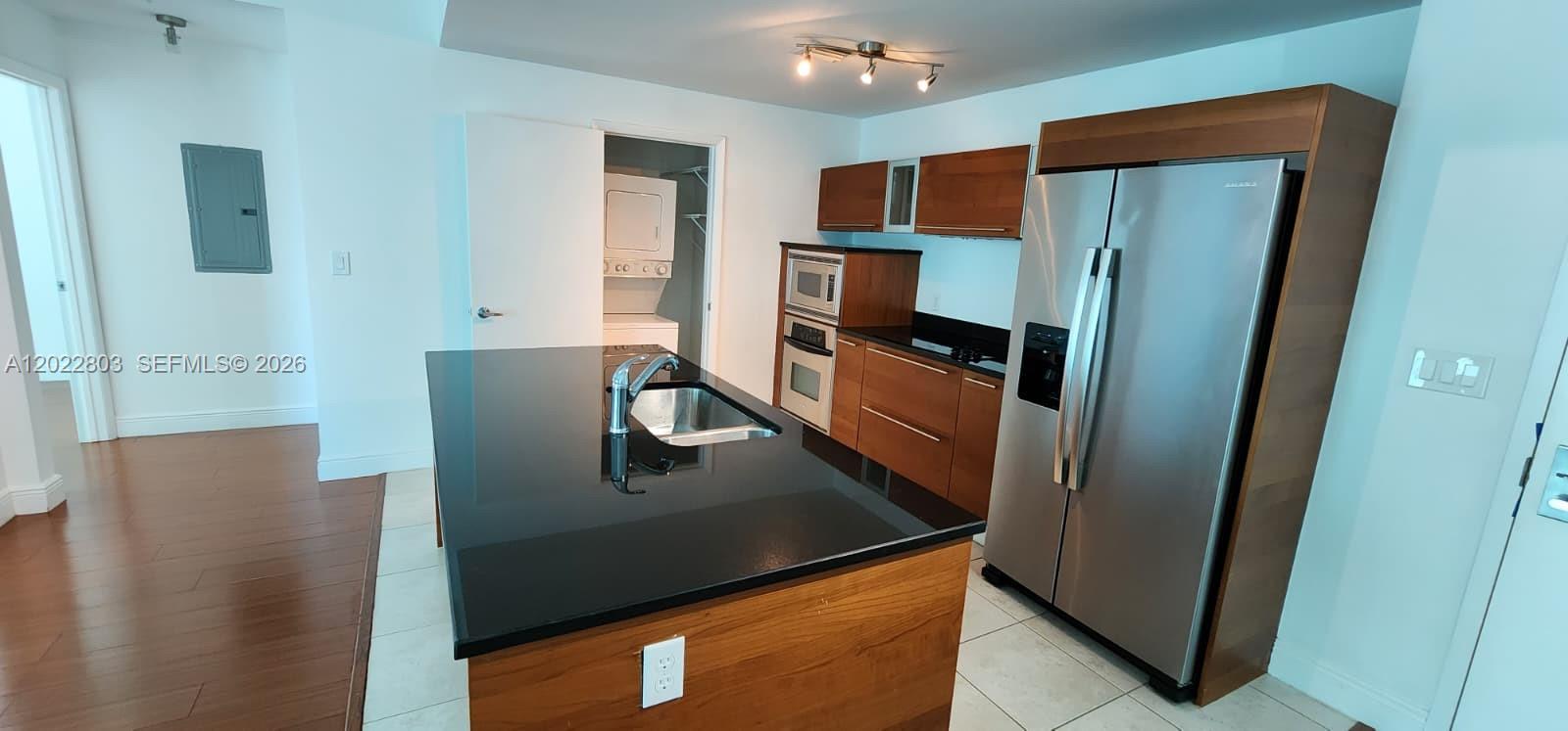 Spacious 1-bedroom, 1-bath residence with 663 SF at Quantum on the Bay in the heart of Edgewater. Bright and functional layout with abundant natural light and private balcony. Excellent investment opportunity, currently rented at $2,750/month through February 28, 2027, providing immediate income. Ideally located across from Margaret Pace Park and just minutes from Wynwood, Design District, Brickell, Downtown Miami, museums, dining, and entertainment. Quantum on the Bay offers resort-style amenities including 2 pools, state-of-the-art fitness center, clubroom, theater, 24-hour concierge, valet, and security. Enjoy urban waterfront living in one of Miami’s most sought-after neighborhoods.