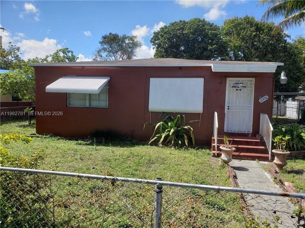 Nice and cozy 3 bedroom, 2 bath home on a corner lot with lots of potential. The home features original wood floors, a large fenced yard with mature fruit trees, and plenty of outdoor space to enjoy.

Conveniently located with easy access to Gratigny Parkway (924), I-95, NW 7th Ave/441, Palmetto Expressway (826), and the Florida Turnpike. Located directly across the street from the local post office and within steps to nearby shops, and neighborhood conveniences. Just minutes from Miami Freedom Park, Hard Rock Stadium, Wynwood, the Design District, Midtown Miami, and Downtown Miami, placing you close to some of the city’s best dining, shopping, and entertainment.

An added benefit is that the property is also zoned for commercial use, providing additional possibilities for professional or small business use (buyer to verify permitted uses).