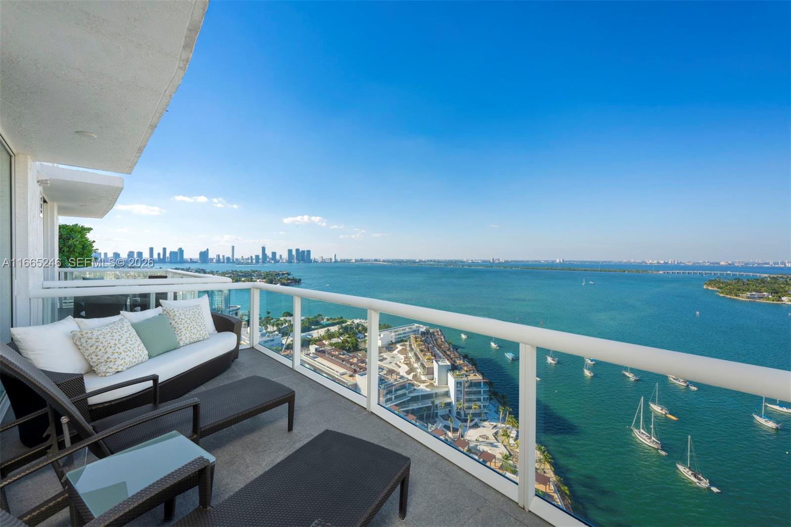 No expense was spared in this one-of-a kind 2 story home in the sky. Enjoy panoramic views of Biscayne Bay, downtown Miami & the ocean from this exquisitely designed & meticulously combined double PH. This 6BR/6BA 6,422sf masterpiece boasts top of the line finishes, 22’ ceilings, Savant smart home system, Kreon lighting, breathtaking glass staircase, open kitchen w/ custom cabinetry, Balsatina stone & wood flooring, 2 master suites w/ morning kitchens, Pneumatic elevator & 5 parking spaces. This exceptional residence offers the ultimate indoor-outdoor living w/3 private terraces & floor to ceiling windows throughout. Luxurious boutique building w/unrivaled amenities including brand new resort style pool w/outdoor kitchen, state of the art fitness center, tennis court & 24/7concierge.