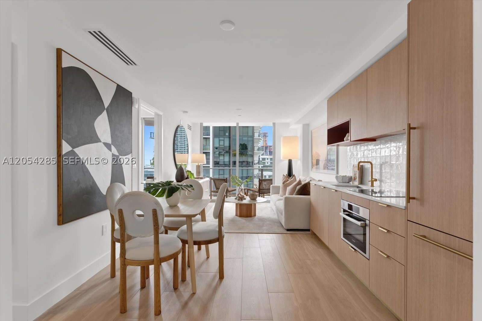 Experience elevated urban living in this brand new, fully furnished 1-bedroom residence in the heart of Midtown Miami. Thoughtfully designed with warm contemporary finishes, floor to ceiling windows, and an open-concept floor plan, the home is flooded in natural light and offers a seamless indoor/outdoor living experience. The expansive private terrace provides a peaceful retreat. 
Perfectly situated between the Design District and Wynwood, this prime location places Miami's premier dining, luxury shopping, renowned art galleries, cafés, and vibrant nightlife just moments away.
Residents enjoy access to an exceptional collection of resort-style amenities, including a 24-hour attended lobby, secure access, a rooftop pool with restaurant and lounge areas, pickleball courts, beautifully designed social spaces, and a state-of-the-art fitness center.
With flexible rental policies allowing short-term leases of 30 days, up to 12 times per year, this residence presents an outstanding opportunity for investors, seasonal owners, or anyone seeking a sophisticated full-time Miami lifestyle.