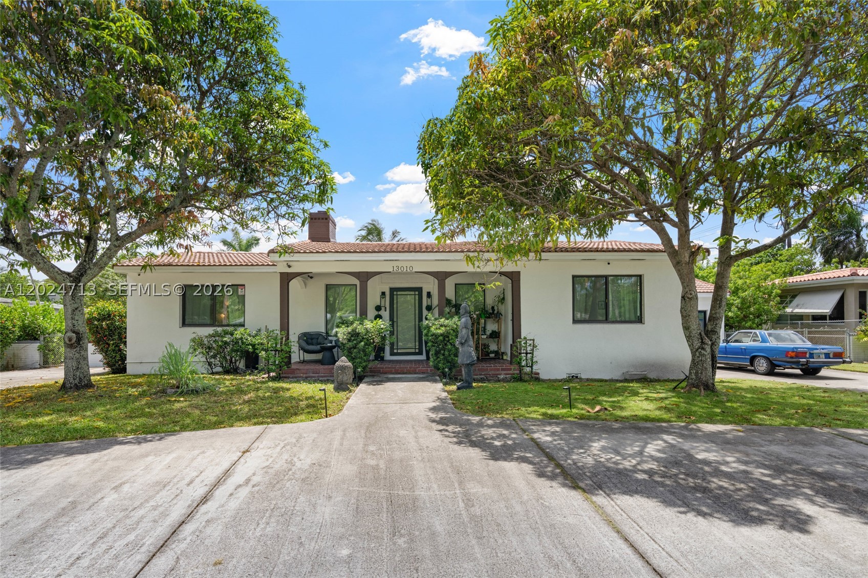 Rare double-lot waterfront compound in historic Griffing Park Estates, next to Biscayne Park. Situated on a peaceful canal, this unique property features a 5BD/4BA main home which includes a fully equipped in-law suite with private entrance and kitchenette. Plus a charming detached waterfront guest house featuring 1 bedroom, walk-in closet, full bath, fully equipped kitchen, and comfortable living room offering the perfect private retreat for guests, extended family, or potential rental income. In total: 6 bedrooms and 5 full baths across a beautifully maintained estate. Enhanced by newer LG stainless steel appliances. Zoned multifamily, offering exceptional potential for investors, income-producing opportunities, or large multigenerational families. Expansive driveway fits 10 cars plus large storage shed for jet skis, fishing gear, and more. Minutes from shopping, dining, Miami Shores, and beaches.