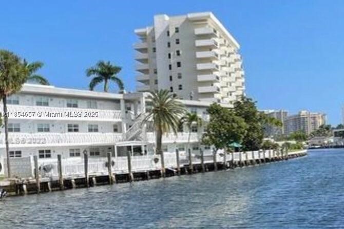 Come take a look at this cozy unit on Golden Isle Drive in Hallandale. It is the best location in the building. This is on the top floor (3)   Overlooking the pool. Great views to a Canal that leads to open waterways in the intracoastal waters. Bring your boat! There is currently one boat dock available to rent.(For unit owners only). Spacious apartment with renovated bathroom and laminate wood floors, flattop stove and newer refrigerator. New Bosh AC put in unit put in recently. Building has security camaras.  Free washer/dryers for owners on each floor. Great walk-ability close to the beach, lots of shopping and restaurants. Call Agent for more info. Roof was recently done. All inspections done. No assessment at this time. This Building painted and well maintained. Very nice pool and barbecue facing the water.Call agent for more info on dock.