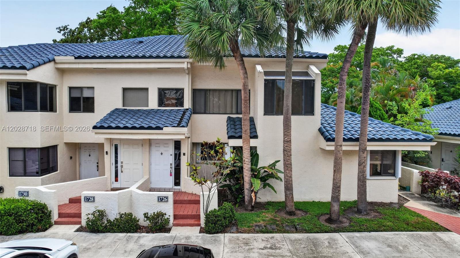 Discover this beautifully renovated residence in the sought-after community of Parc Village in Plantation. Updated in 2020, this move in ready home features soaring ceilings, a modern kitchen with stainless steel appliances, quartz countertops, pendant lighting, and an expanded pantry for added storage. The open-concept layout is filled with natural light, while the spacious primary suite offers vaulted ceilings, generous closet space, and a tastefully updated en suite bath. Enjoy the comfort of an in unit LG washer and dryer, assigned parking, and convenient guest parking. Residents have access to a variety of community amenities, including a waterfront pool, spa, outdoor entertainment areas, and a dog park (one pet permitted, up to 25 lbs.). Ideally situated near shopping, dining, parks, major highways, and the airport, this home combines style, comfort, and convenience in a prime location.