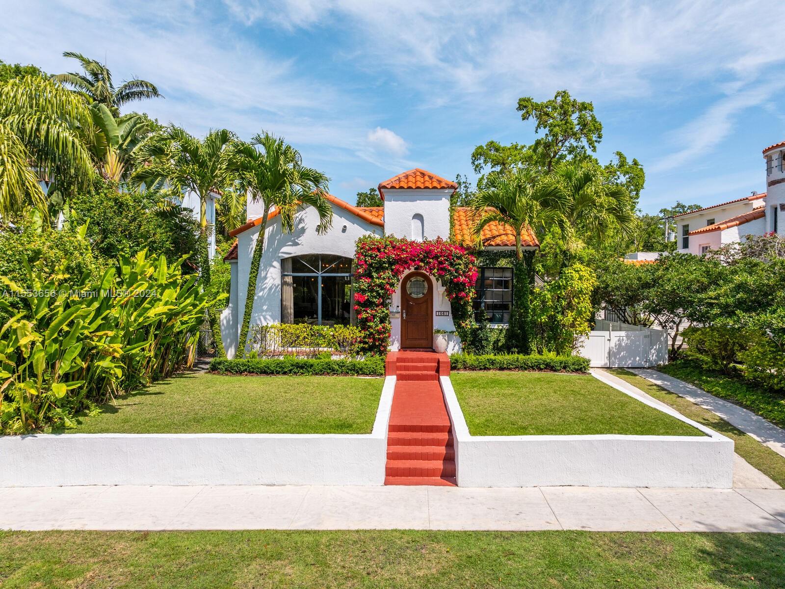 Welcome to Villa Bougainvillea! Discover your private sanctuary in this beautifully updated 1920s Spanish Med-Revival home and guest house! Perched on a hill and one of Miami Shores’ most charming homes, the three-bedroom main house is full of period character and great features: an enchanting front entry with tower detail and original door; bright open living with vaulted ceiling, hardwood floors, arch details, fireplace and gorgeous front picture window; magazine-ready updated gas range kitchen with wine cooler and storage galore; bright bedrooms; updated full bath; plus a powder room/cabana bath. The picture-perfect lush rear gardens include a sparkling scalloped-edge heated pool; covered dining patio; and a private one-bedroom 670 SF casita with living, kitchen, and spacious bathroom.
