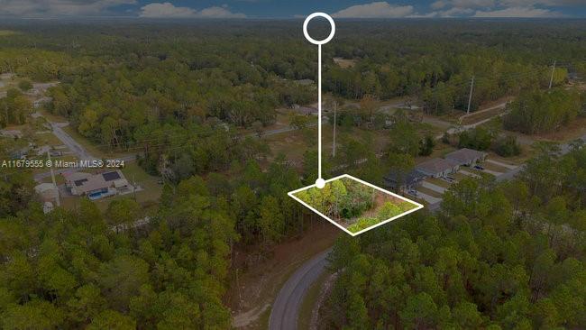 Excellent investment opportunity !  Extra large lot ,  26,603 sq. ft. .  Great location to build a multi-family property.Zoned for triplex.  Requires sewer.
This location gives you the opportunity to enjoy nature, biking, hiking and it is only minutes away from shops, restaurants,supermarkets and much more.   Drive by to appreciate the area !  Call Listing Agent.