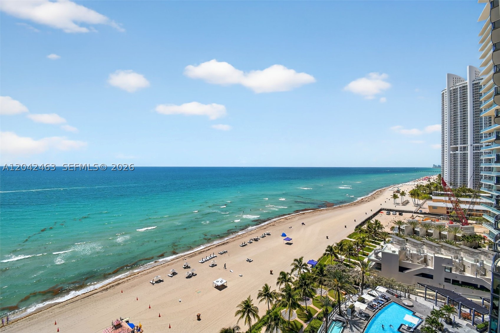 Unit 1401 at Millennium Condo in Sunny Isles Beach offers a stunning and updated 3 Beds + Den (which can be used as a bedroom or an office space), 3.5 Baths, and 2,210 sq. ft. of living space featuring a private elevator opening directly into your foyer, marble floors throughout, a spacious open balcony with breathtaking direct ocean views, and 2 assigned parking spaces. The building elevates the lifestyle amenities with a heated oceanfront pool with Jacuzzi, a two-story state-of-the-art gym, steam & traditional sauna, tennis court, party room, business center, and full beach service with towels & chairs, delivering an exceptional blend of luxury, comfort, and coastal elegance.