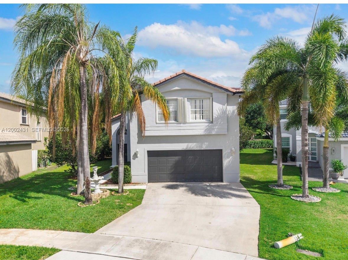 An absolute must visit: 2,951 square feet of space, with four bedrooms and two and a half bathrooms. a unique oversized lot features lush landscaping and ample parking.
The home's entryway is highlighted by a grand, vaulted ceiling, which fills the space with abundant natural light. The neutral color palette and elegant lighting fixtures create a refined and welcoming ambiance. The open layout allows the living and dining areas to flow seamlessly, with the spacious dining area providing an ideal setting for hosting gathering
The kitchen boasts ample countertops and cabinetry, offering abundant storage and preparation space. Hardwood floors extend throughout the main living areas, contributing to the home's overall elegant aesthetics.
Stepping outside, the home's expansive patio is surrounded by lush greenery, providing a tranquil outdoor living space. Sizable is an ideal setting for relaxation and recreation.
Hurricane shutters/ attached garage and additional guest parking, the house is located close to highways.