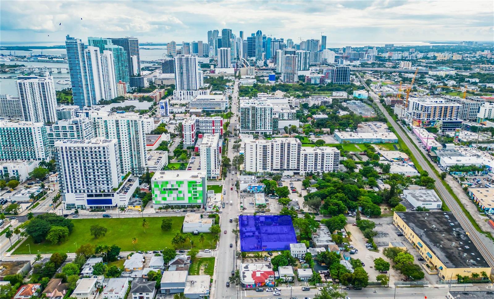 Proud to introduce a prime investment opportunity in Miami’s vibrant Edgewater neighborhood, featuring 27,202 square feet of development potential. Nestled within a Qualified Opportunity Zone and within the proposed Northeast Residential Density Increase Area, the surrounding area is witnessing a surge in multi-family development, commercial spaces, and cultural amenities, creating a vibrant and dynamic community that is on the brink of transformation.
The assemblage is uniquely positioned at the intersection of the Omni/Arts & Entertainment District, Edgewater, Wynwood, and Midtown neighborhoods and the block has been touted as the future location of the proposed train station, which could trigger additional zoning changes to promote transit-oriented development in the area.