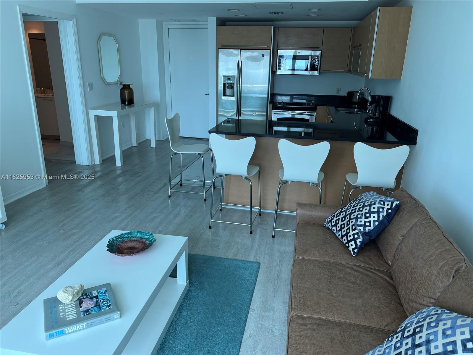 THE PLAZA 901 BRICKELL CO - Residential Lease