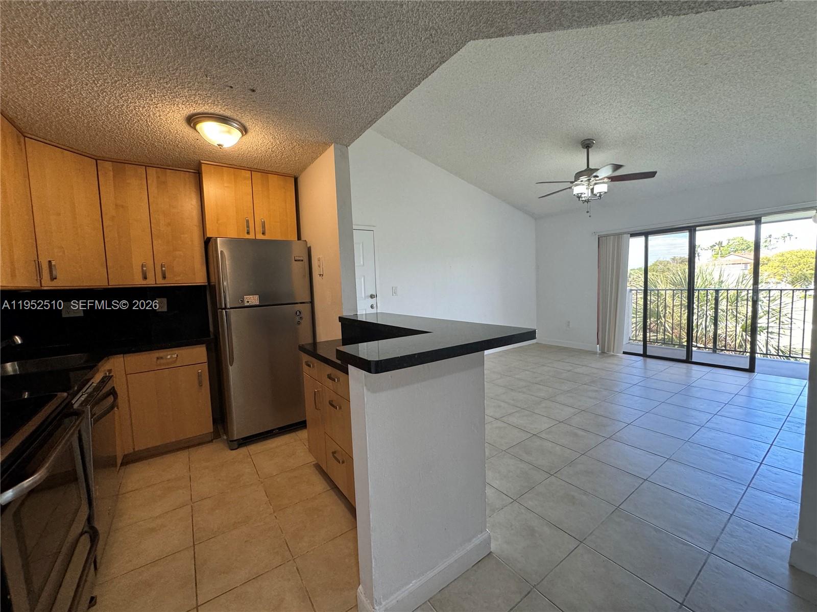Desirable Hialeah Area. Well-kept corner unit featuring 2 bedrooms and 2 bathrooms with a canal view from the balcony. The living room offers high ceilings, oversized bedrooms, and an upgraded kitchen with stainless steel appliances, breakfast bar, and in-unit washer and dryer. Located in a centrally located, gated community with pool, tennis courts, and clubhouse. Recently updated with a new A/C unit and new water heater. Includes 1 assigned parking space. Currently tenant-occupied on an annual lease, generating $2,200/month in rental income. THERE IS NO SPECIAL ASSESSMENT, CONDO DID THE STRUCTURAL INSPECTION AND ALSO PASS THE MILESTONE INSPECTION. Tenant occupied unit 4/30/2027 $ 2200