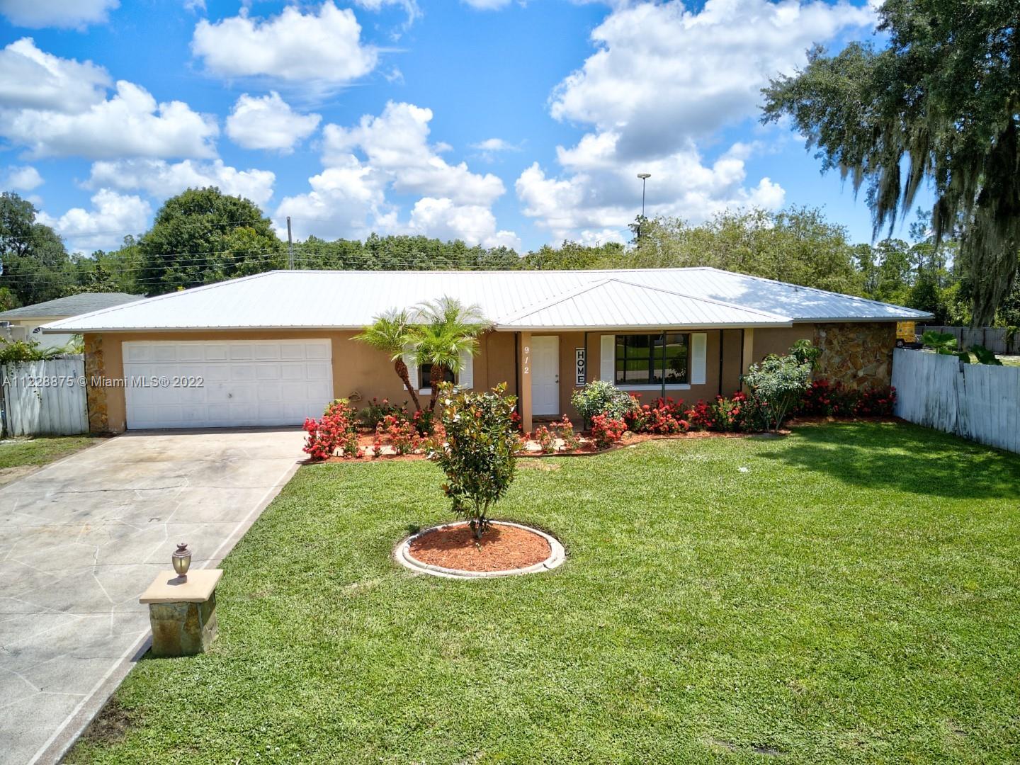 RARE FIND LOCATION, LOCATION,LOCATION! Very cute well maintained 2/2/2 in desirable Harder Hall- Lake Haven neighborhood with 3/4 of an acre, fully fenced! No HOA, this house will not disappoint. 
New metal roof in 2017, brand new carpet in bedrooms, all brand new appliances (Dishwasher,  Refrigerator, Stove), inside laundry room with used washer and dryer.
Cathedral ceiling in living room and tile through out the main area.
Sit and enjoy the front porch in this quiet street, the glass porch in the back or the back porch. Split floor plan, large owner's suite with walk-in closet and nice size second en suite bedroom.