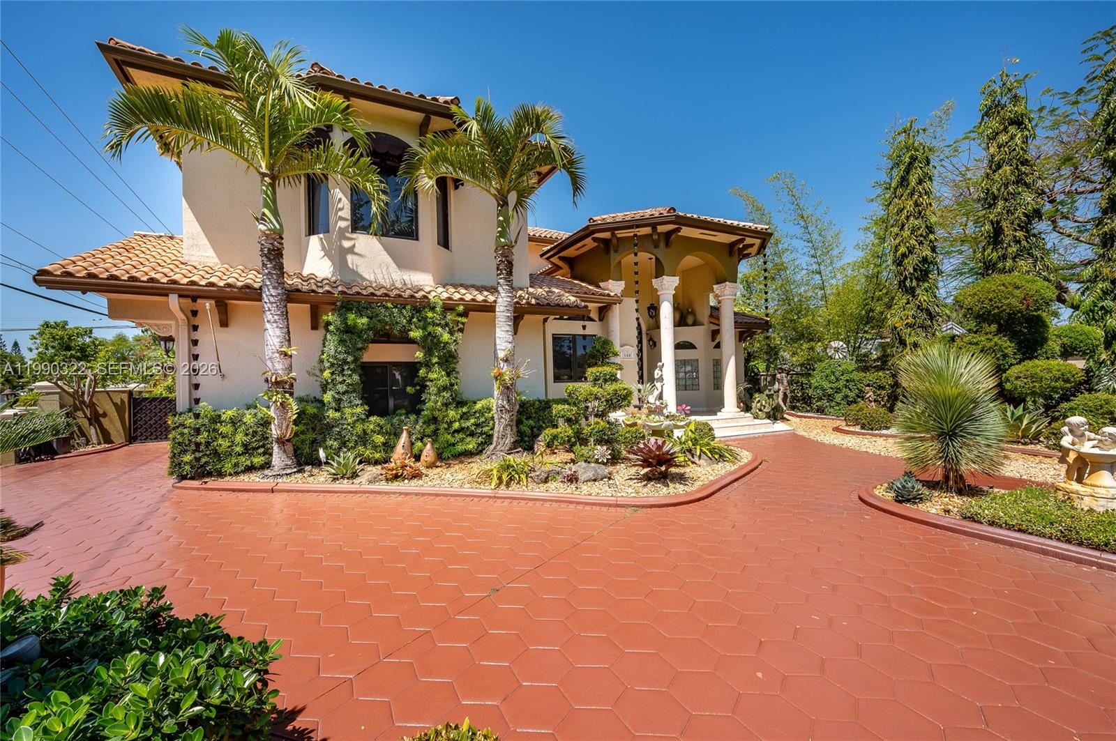 Step into this stunning residence on a corner lot. Truly an architectural statement inside & out. This two-story home features 5 bedrooms ,4 bathrooms, 2 car garage & a pool. Thoughtfully designed for comfort & versatility. 2 bdrm upstairs & 3 bdrm conveniently located downstairs, an ideal layout for families & guests. Step inside to soaring cathedral ceilings & elegant marble flooring that set the tone for a light filled sophisticated interior. This exceptional residence features an expansive family room alongside an elegant formal living room, offering the perfect balance of comfort & refined entertainment. A striking steel staircase serves as a stunning architectural centerpiece elevating the home’s design. The chef’s inspired kitchen is equipped with a spacious island, granite countertops & wood cabinetry. Hurricane impact windows & doors provide peace of mind, while dual AC units ensure year round comfort. The primary suite features two walk-in closets, a spa like bathroom with a soaking tub & a separate shower. Outdoors, enjoy your private oasis with a saltwater pool, a pergola, cabana bathroom & a fully equipped built-in bar & BBQ area perfect for hosting & relaxing while the lush landscaping enhances the home’s curb appeal. A whole house generator provides convenience & security during storm season. This home truly offers the perfect blend of luxury, functionality & outdoor living. All of these features are combined in a much sought-out neighborhood in Miami Springs.