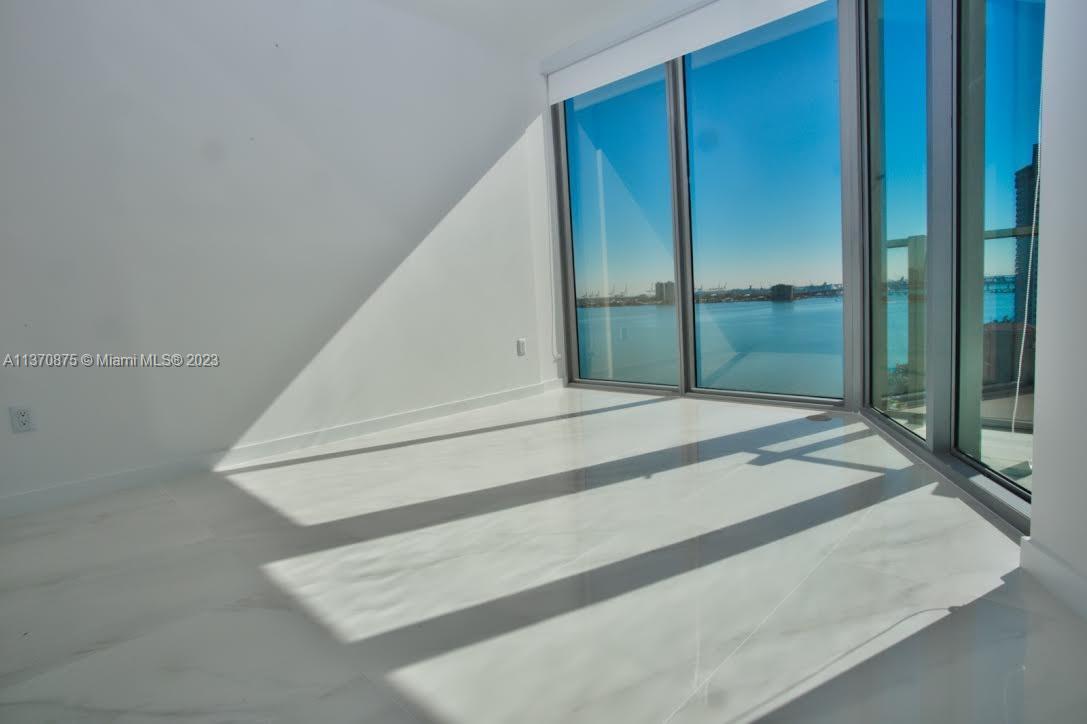 Enjoy this magnificent unit with direct bay views in the newest and most luxurious building in East Edgewater. 1 bedroom + spacious den, 2 bathrooms with 110 SQ.FT terrace. private elevator, walk-in closets, top-of-the-line appliances, window treatments, incredible Bay views from every room. Biscayne Beach's interiors were designed by renowned Bravo star and design expert Thom Filicia. Luxury amenities including 2 pools, cabanas, a beach club, state of the art gym, spa, tennis courts and much more!
