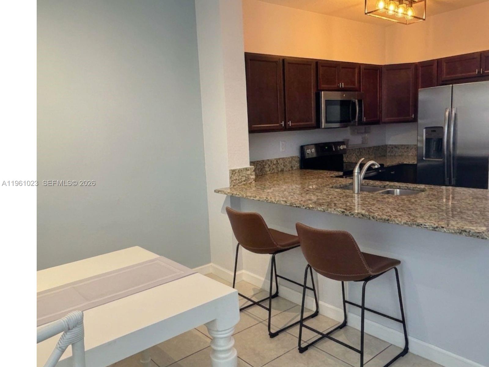 Strategic Opportunity in Isles at Oasis (Fiji)! Modern 3 bedroom, 2 bathroom unit offering the perfect balance of comfort and profitability in Homestead's fastest-growing area
Why this is the best decision:
 1. High-Value Location: Immediate connectivity to the Turnpike and US1. You are at the perfect midpoint between Downtown Miami and the Keys, just minutes from Baptist Hospital and Homestead's new commercial developments.
 2."Resort" Lifestyle: Exclusive access to the Isles at Oasis Clubhouse. Includes a lagoon-style pool, fully equipped gym, jacuzzi, and private security. Offers a luxury quality of life with a reasonable HOA.
 3. High-Demand Asset: At 1,151 sq. ft. (built in 2017), this unit exceeds the local average size. It is a highly sought-after product for both qualified tenants (high ROI) and families demanding space and modernity.
Excellent natural light. Sale includes all appliances: side-by-side refrigerator with water/ice dispenser, range, microwave, dishwasher, and washer/dryer. Also features a private external storage unit. Furniture is negotiable (not included in list price).