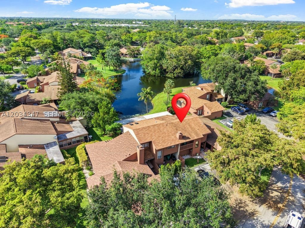 LOW MONTHLY HOA AND NO APPROVAL NEEDED. 
Rarely available lakefront townhome in the desirable Banyan Lakes community! Offering 3 bedrooms, 2.5 bathrooms, a den/office, and over 2,100 square feet of living space, this spacious two-story residence features a functional layout designed for comfortable everyday living.
The home offers generous living and dining areas, an updated kitchen with a breakfast area, abundant storage throughout, and plenty of natural light. Enjoy peaceful lake views from multiple rooms, including the primary suite, as well as a private screened patio perfect for relaxing or entertaining.
Additional features include impact windows and doors, newer A/C and water heater, laundry room, and assigned parking. Brand new stove and washer and dryer.
Residents enjoy access to community amenities including a clubhouse, pool, and playground. 
Conveniently located near major highways, shopping, dining, parks, and schools. A wonderful opportunity to enjoy spacious lakefront living in a well-established community.