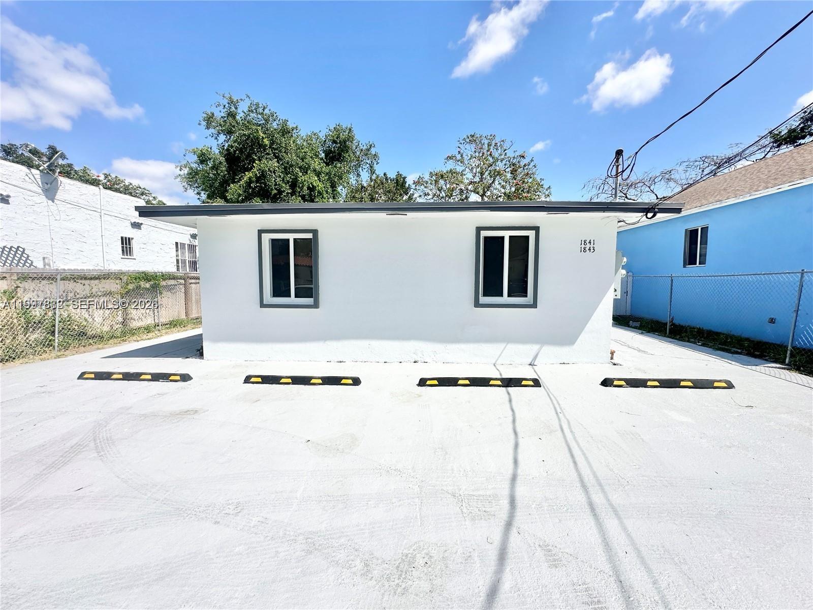 Recently and fully remodeled two-bedroom and one-bath in a duplex in a quiet residential area! The apartment has been fully renovated and features brand new ceramic tile flooring throughout, a New Kitchen and new stainless steel appliances, Central A/C and Washer and Dryer Hook-Up inside the unit! The property features a backyard for outdoor living and 2 assigned parking spots. Located close to I-95, Miami Design District, Wynwood, and Downtown! Renters insurance is required. The tenant is responsible for electricity, water, cable, and internet!