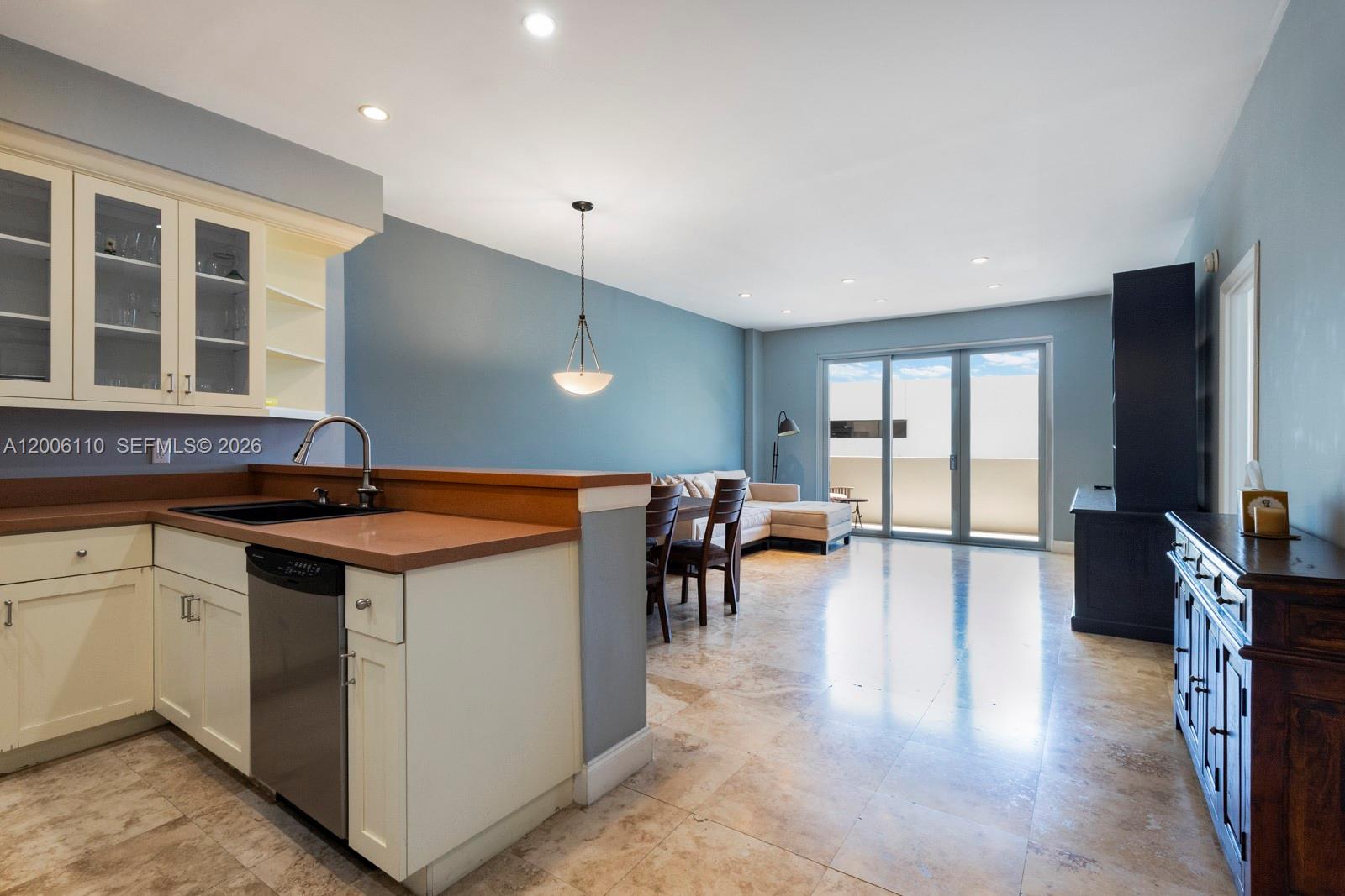 Spacious 1-bedroom, 1.5-bath residence on lanai level, featuring an updated kitchen and bathrooms, along with hurricane-impact glass for complete privacy. The unit includes 1 covered parking spot and a storage unit. Building amenities offer a bayside pool and fitness center. ideally located on Belle Isle near The Standard Spa, with easy access to Sunset Harbour, and the beach- all within walking distance.