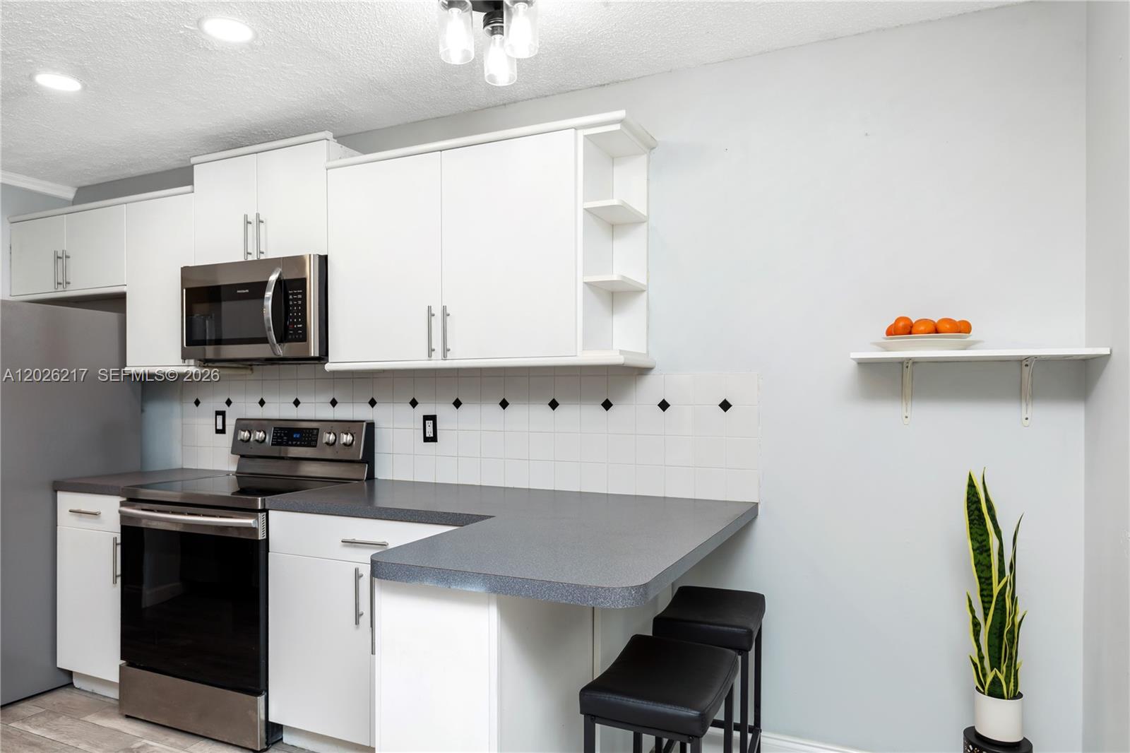TARTAN COCONUT CREEK PHAS - Residential