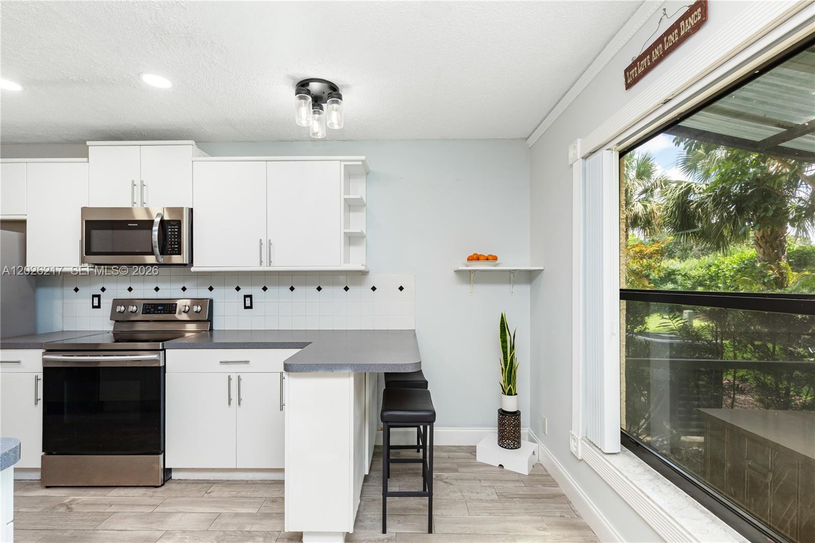 TARTAN COCONUT CREEK PHAS - Residential