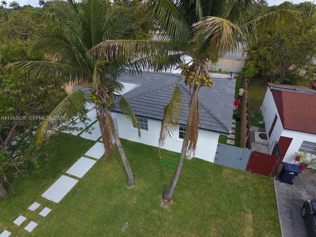 Beautifully maintained 4-bedroom, 3-bathroom home in a prime Aventura-area location. This spacious residence features a NEW roof, updated bathrooms, and a modern kitchen with stainless steel appliances. The split floor plan offers privacy with open living and family rooms, a formal dining area, wood and tile flooring, fresh interior paint, and a dedicated laundry room. Enjoy a large patio and fully fenced backyard with a storage shed—perfect for outdoor living and entertaining. Located minutes from A+ rated schools, Aventura Mall, major shopping, dining, and I-95. Zoned 3050 UC EDGE (Residential – up to 2 stories), offering added flexibility and long-term value.