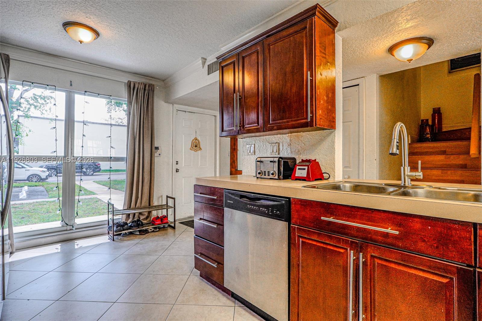 Stunning renovated 4BD/3BA two-story home in the heart of Hollywood, offering ~1,700 SQFT and a large private garden. Steps from TY Park, minutes to beaches, I-95, shopping, dining, schools, and houses of worship. Newer roof, no assessments, and can lease immediately. Enjoy a bright open layout, updated kitchen, in-unit laundry, plus community pool, clubhouse, gym, insurance, water, roof, and landscaping included in the HOA. Perfect for families, commuters, or investors.