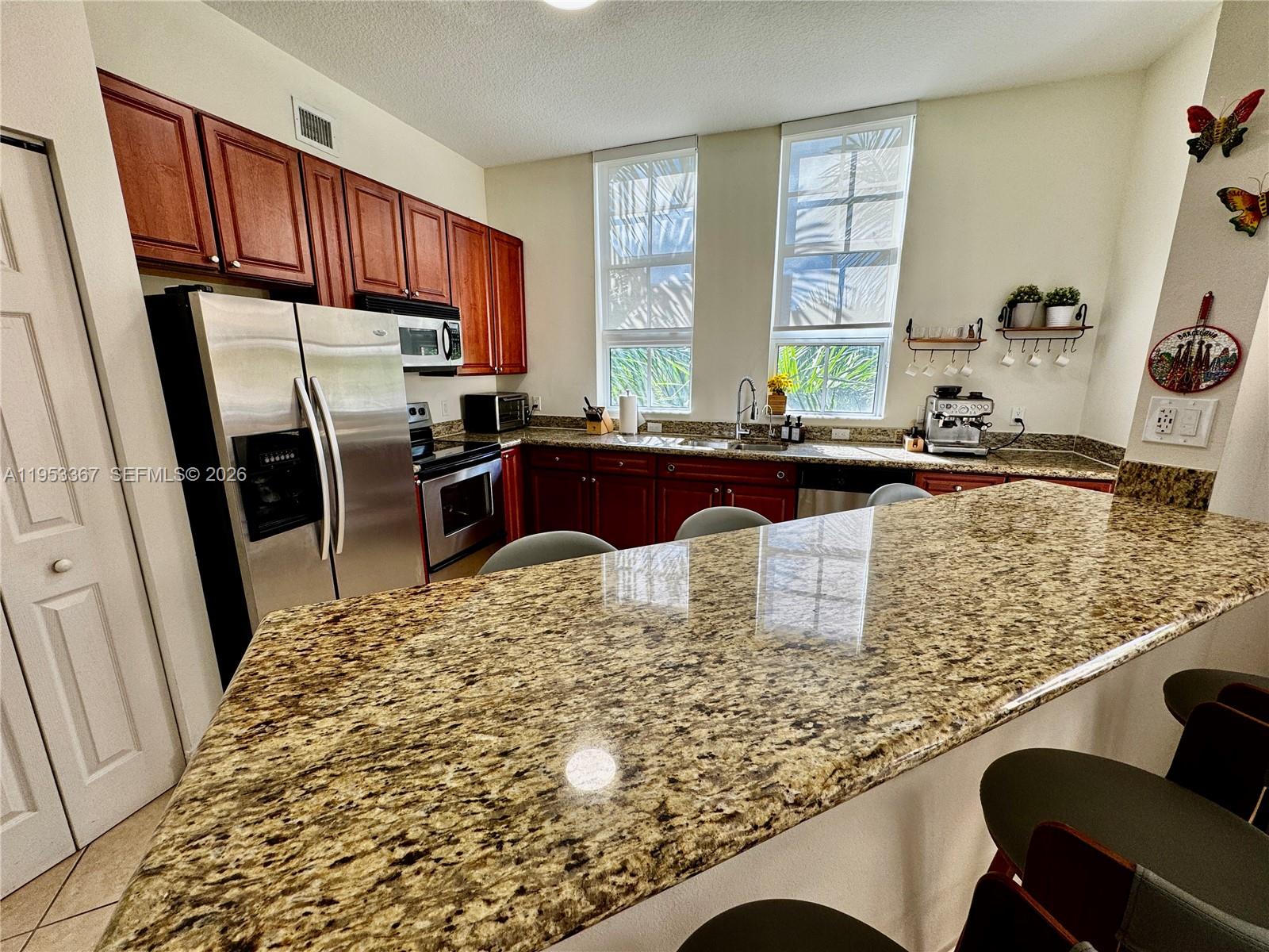 ALAQUA CONDO - Residential