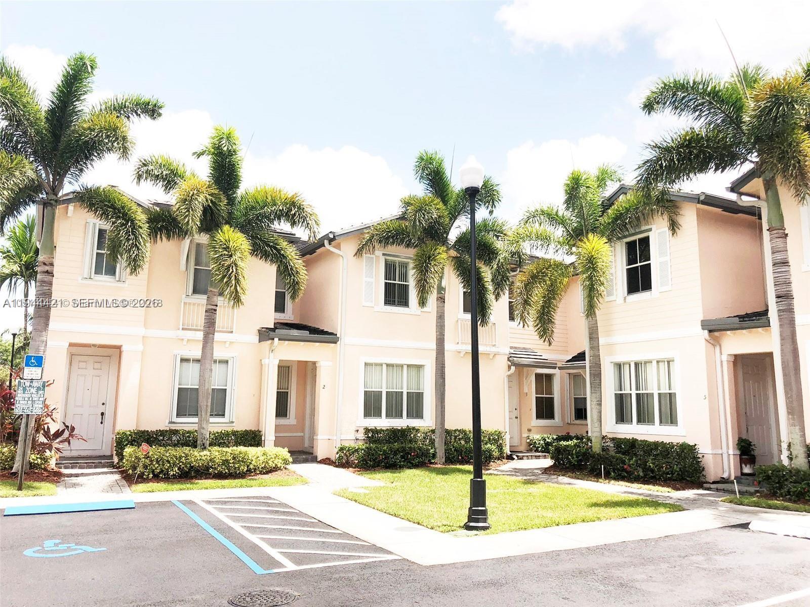 MINT GATED FIJI CONTEMPORARY 3 BEDROOMS 2.5 BATH STORY TOWNHOUSE IN PRISTINE CONDITION WITH FEATURES INCLUDING A BRIGHT OPEN FLOOR PLAN, FORMAL LIVING, DINING & FAMILY ROOM AREAS & A GOURMET KITCHEN WITH ALL APPLIANCES & SNACK COUNTER. THERE ARE TILE FLOORS DOWNSTAIRS AND VINYL FLOORING ON THE STAIRS AND UPSTAIRS IN THE HALL AND BEDROOMS. OUTSIDE IS A NICE OPEN REAR YARD WITH STORAGE ROOM. EXTRAS INCLUDE HURRICANE SHUTTERS & PRIVATE WASHER & DRYER. AMENITIES INCLUDE A CLUBHOUSE, POOL, GYM & PLAY AREA. CLOSE TO SCHOOLS, SHOPS, TURNPIKE & OUTLET MALL. PLENTY OF GUEST PARKING AND ONE ASSIGNED PRIVATE PARKING SPACE.