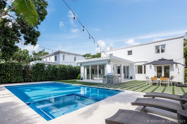 Located on highly sought-after North Bay Road, this move-in-ready Miami Beach residence is a modern tropical oasis! Featuring 4 BD, 3.5 BR, a formal living room with an original working marble fireplace, a formal dining room, a bright and open dine-in kitchen with custom white cabinetry and top of the line appliances, an office, a spacious laundry room, all impact windows, and a full-house generator. Each of the bedrooms has oak wood flooring and custom closets, and both the master and west guest bedrooms have oversized terraces for sunset viewing. The impeccably designed backyard includes a summer kitchen, a large pool, and a natural gas firepit - an entertainer's delight. Don't miss this opportunity to live in luxurious tropical seclusion only minutes from the buzz of South Beach!