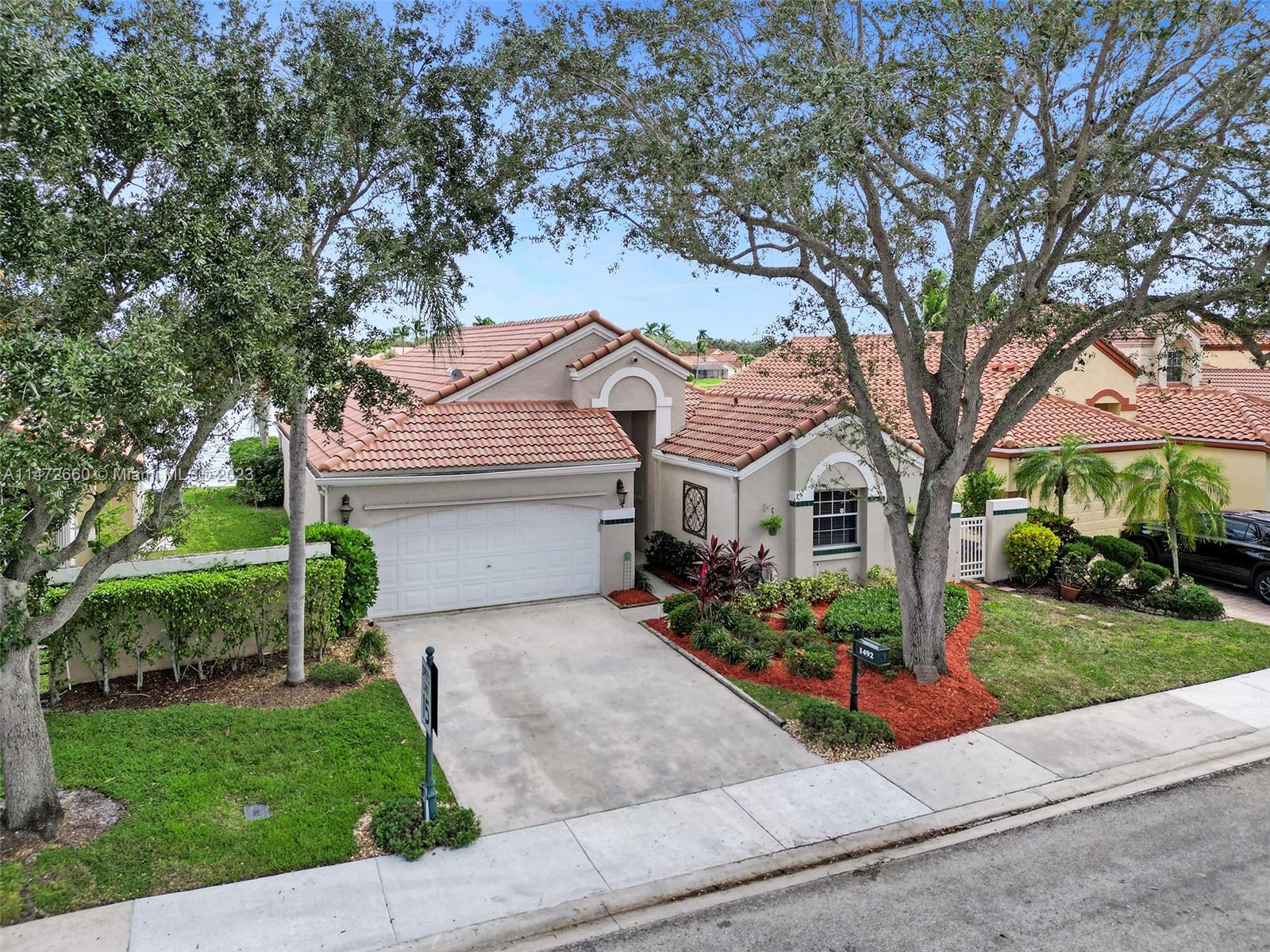 This BEAUTIFUL HOME is located on a prime lot in Coral Harbour, featuring a LOVELY POOL and beautiful PANORAMIC VIEW OF THE LAKE! Kitchen features include GRANITE COUNTERTOPS, CUSTOM CABINETS, stainless steel appliances, and accent lighting. Primary bath features include a WHIRLPOOL TUB, separate CUSTOM SHOWER, beautiful VANITY WITH DOUBLE SINKS and a private water closet. Hurricane shutters all around. Just steps to Weston Town Center, featuring restaurants, shopping and special events. All supplies for 2nd bathroom updating are located in the garage and included in the sale. *READ BROKER'S REMARKS!*