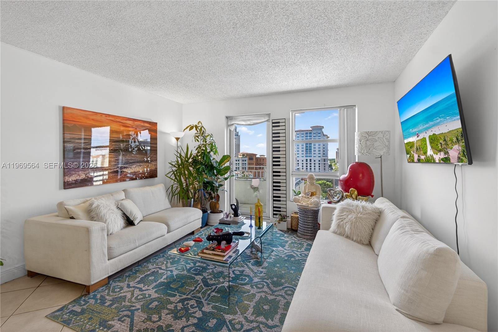 PRICED TO SELL!!! Great value in a prime location just across from Coral Gables. This SFLA 1,110 2-bedroom + 2-bath condo with plenty of windows offers fantastic views and an unusual sense of privacy in an urban setting. Split floor plan with large bedrooms and main room has a walk-in closet. Features include tiled flooring throughout, kitchen with granite countertops, abundant storage, spacious laundry closet, and covered parking. EV charging available in the building. Amenities include pool, fitness center, business center, meeting room and 24 hours concierge. Recently renovated building with no special assessments. Unbeatable convenience: approximately 15 minutes to Miami International Airport, about 20 minutes to the beach, and just a few blocks from Miracle Mile and The Plaza for dining and shopping.