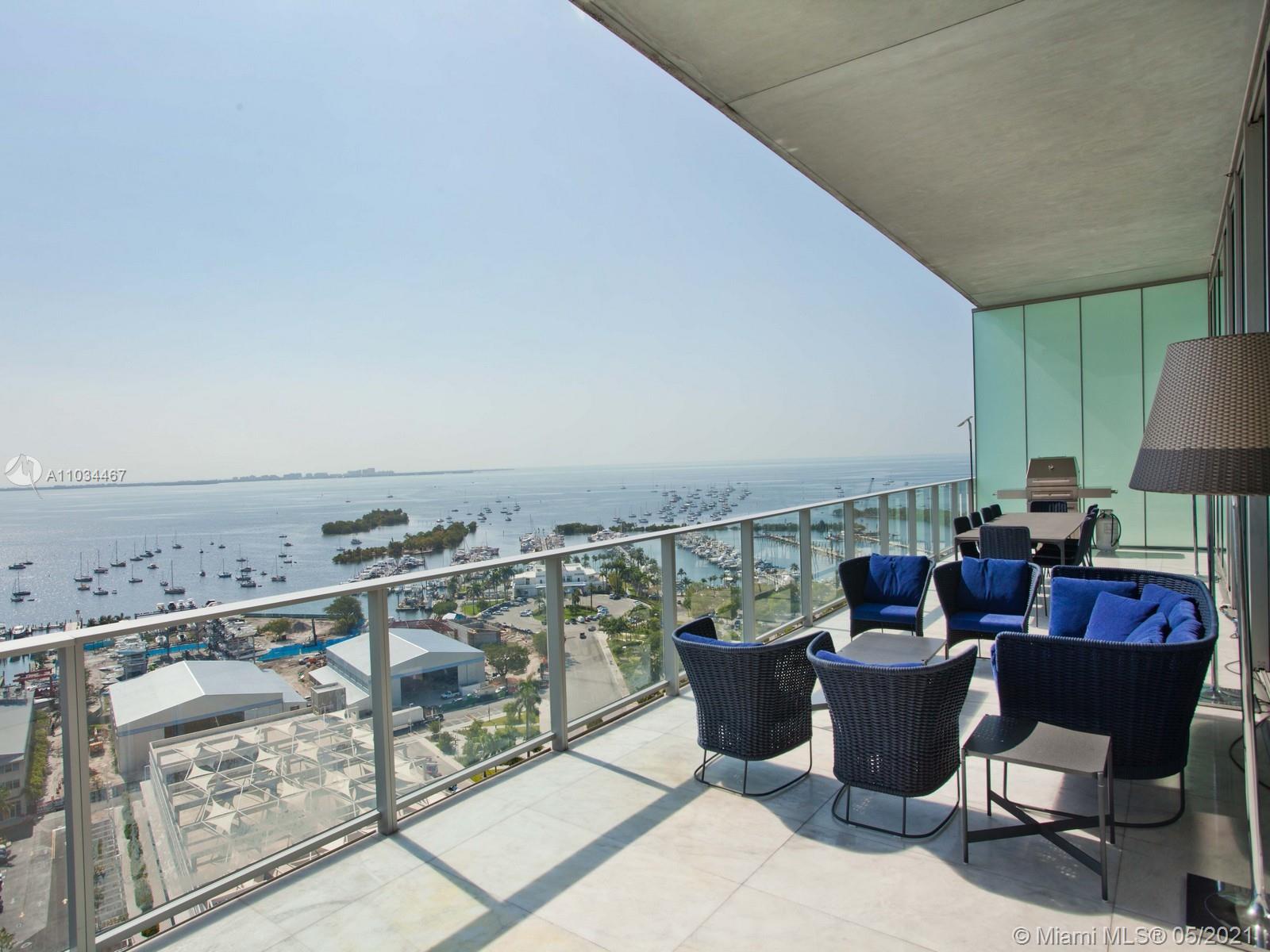 Spectacular Modern luxury condo at the Grove at Grand Bay South Tower in Historic Coconut Grove.  An iconic residence that evokes luxury. Distinctive contemporary design includes 12 foot floor to ceiling glass doors and unobstructed panoramic views of beautiful Biscayne Bay.  This 6 bedroom and 6 1/2 bathrooms unit is one of a kind, including natural light in every room and and open spacious floor plan.  Original finishes from the developer were entirely upgraded to the finest materials and craftsmanship.   Upgraded finishes includes Poggenpohl Kitchen, Sub-Zero Fridge, Freezer and Wine Cooler, Marble Bathroom floor to ceiling, Italian Cabinetry in Bathrooms, Custom Italian Library, Custom Cabinetry in Laundry, Two and half car garage with custom cabinetry and commercial resin flooring.