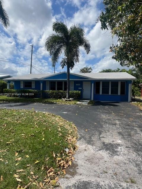 This renovated 2BD 1 BTH dream home in the desirable Coral Ridge Isles neighborhood is sure to impress. The open concept kitchen boasts beautiful cabinets and provides ample natural light through its numerous windows. The roof was replaced in 2017 and the home features hurricane impact windows. New electric & surveillance have been done. Conveniently located near Holy Cross Hospital, the area offers a vibrant dining and shopping scene, and you're just a short drive away from the beach.