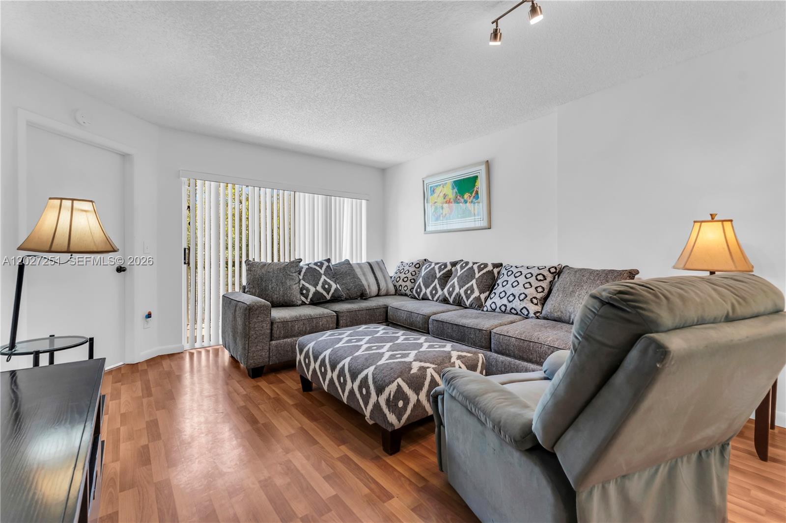 Beautiful and rare 1-bedroom condo in the gated Kings Point Weldon community featuring serene lake views from the covered patio. This spacious 55+ residence offers a large primary bedroom with a walk-in closet, in-unit washer and dryer, laminate flooring throughout, and tile flooring in the kitchen and bathroom. Residents enjoy resort-style amenities including a clubhouse, billiards, pickleball courts, indoor and outdoor pools, sauna, fitness center, and group exercise classes. The impressive Kings Point Palace Theater seats over 1,000 guests and hosts a variety of live entertainment and events. Community courtesy bus service provides convenient transportation for shopping and local errands.