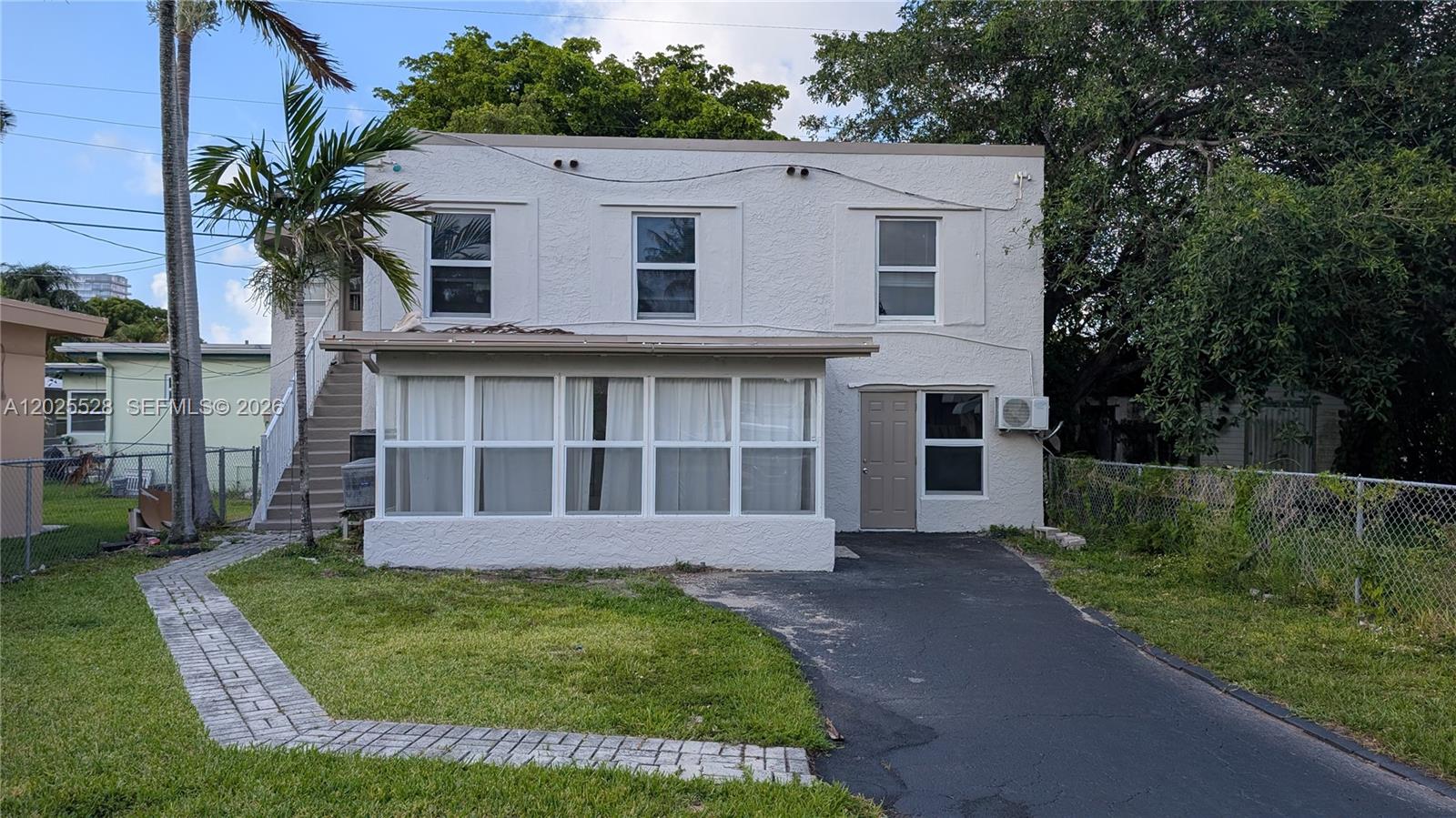 Spacious 2-bedroom, 2-bathroom unit available in this two-story duplex. Located on the ground floor, this home features a large living area, an en-suite bathroom in the primary bedroom, and plenty of natural light throughout the main living room. Conveniently situated east of US-1, just minutes from the shopping and dining on Hallandale Beach Blvd, as well as the beautiful Hallandale Beach