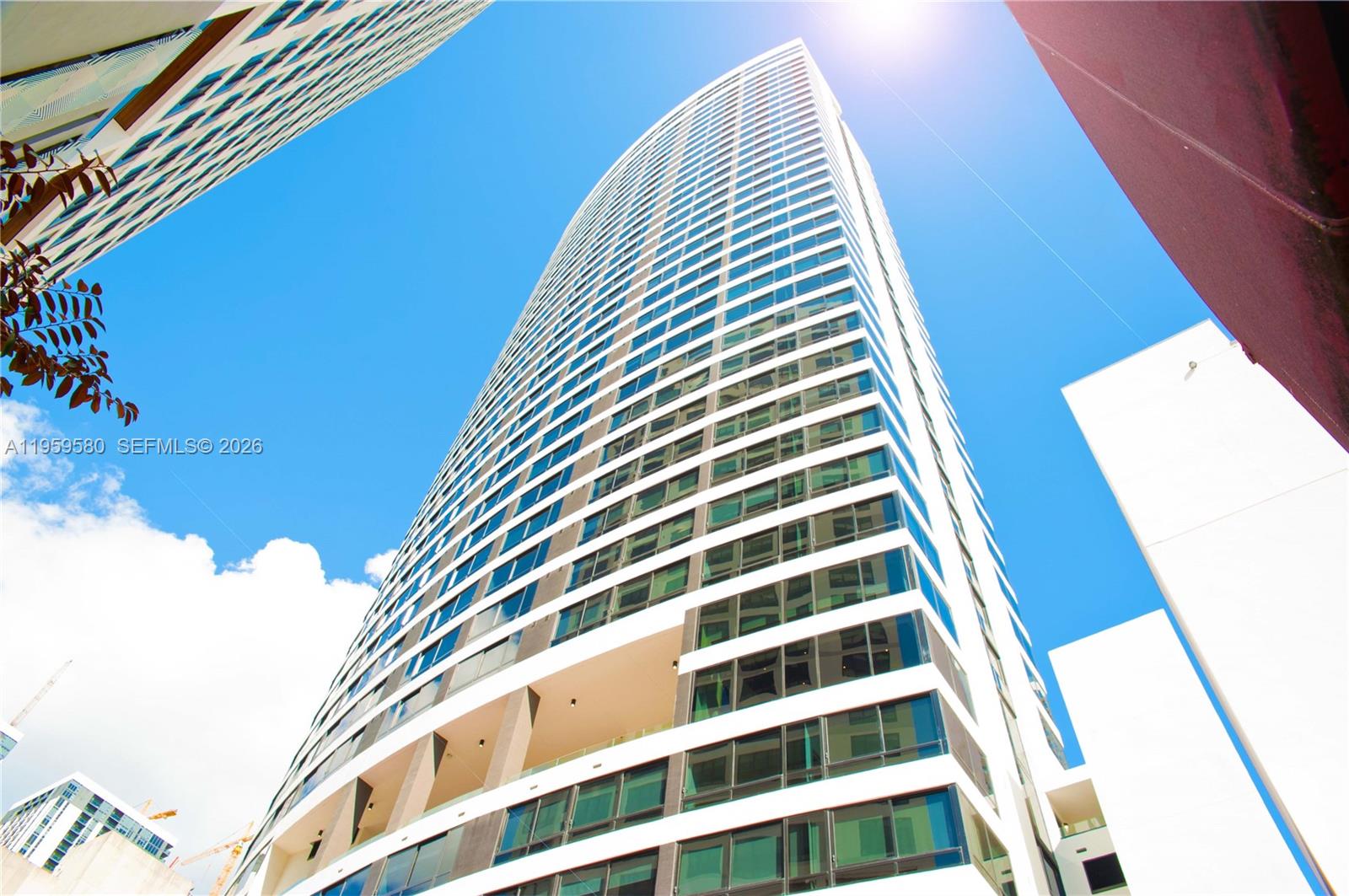 Turnkey, fully furnished studio at District 225, Downtown Miami’s most dynamic short-term rental–friendly luxury towers. 1 parking space! This thoughtfully designed unit features a smart, space-maximizing layout with modern finishes, sleek flooring, a contemporary kitchen with European-style cabinetry and premium appliances, and a stylish spa-inspired bathroom. Floor-to-ceiling glass showcases vibrant city views, creating an inviting living space.. Delivered completely furnished and rental-ready, this residence offers immediate income potential. Owners may self-manage short-term rentals such as Airbnb or enroll in the building’s in-house management program for a convenient, hands-off approach. District 225 delivers a true resort-style experience with amenities designed to attract strong rental demand, including an expansive pool deck, indoor/outdoor bar, social lounges, fitness center, yoga and spin studios, indoor basketball and racquetball courts, rock-climbing wall, spa with sauna and steam rooms, and a full co-working floor with meeting spaces. The rooftop deck features a plunge spa, summer kitchen, and panoramic views of the Miami skyline and Biscayne Bay. Located in the heart of Downtown Miami, steps from Miami Worldcenter, Brightline Station, Bayfront Park, dining, shopping, and entertainment, this unit combines lifestyle appeal with exceptional flexibility and income potential in Miami’s fastest-growing urban neighborhoods.