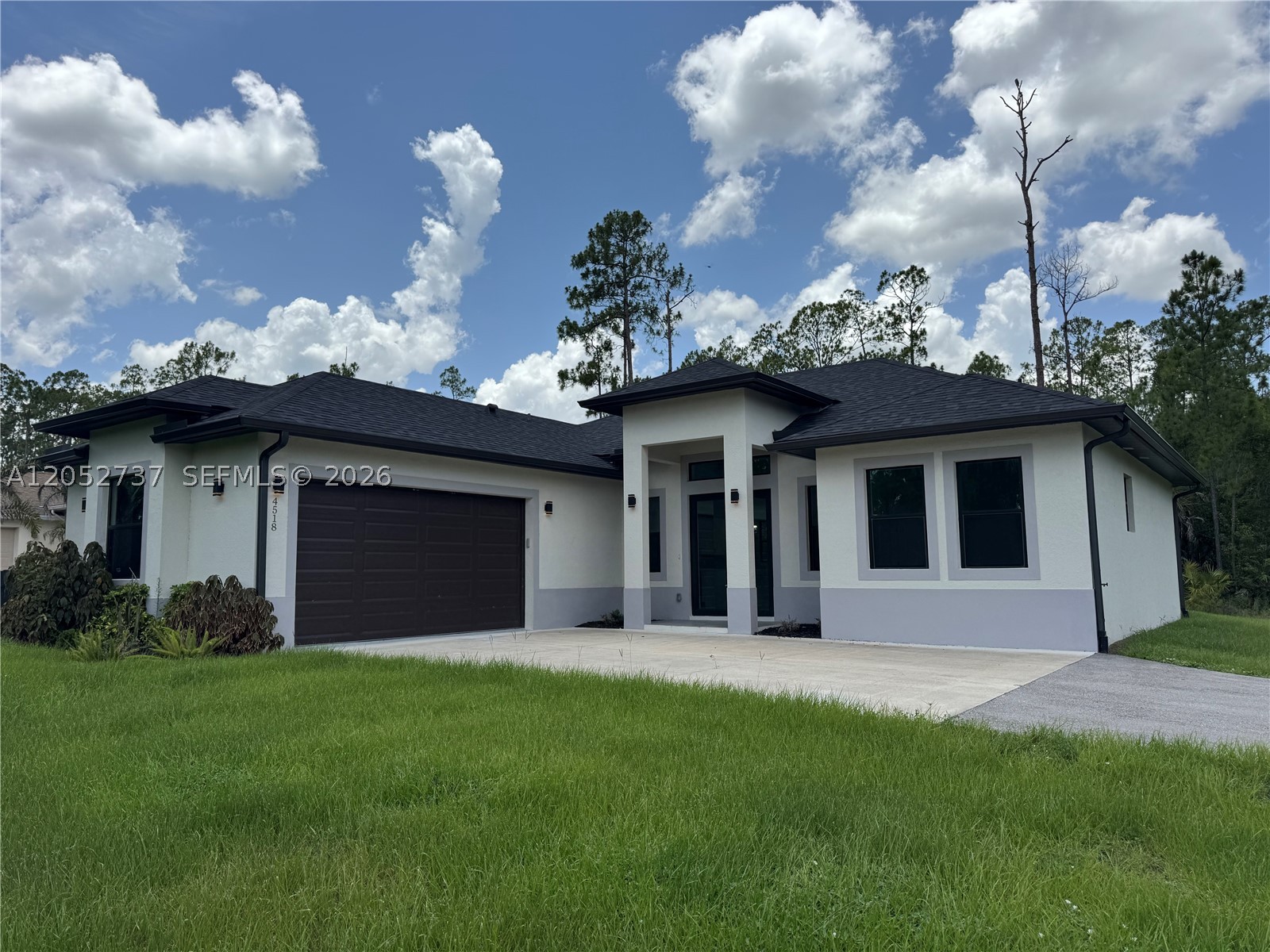 Stunning 3/2 on 1.64 DRY Acres! Welcome to your future home at 4518 6th Ave SE in Golden Gate Estates, Naples, FL! This new construction features 1,622 sq ft of living space, plus 2,216 sq ft, including the garage and outdoor areas. With 3 bedrooms and 2 bathrooms, this home sits on a spacious 1.64-acre east-facing lot, perfect for beautiful sunrises. Constructed on a 100% DRY LOT. Enjoy the convenience of being a short drive from downtown Naples, offering fine dining, shopping, and cultural attractions. The pristine Naples beaches are also nearby. Plus, it's only a 2-hour drive from Miami/Fort Lauderdale, ideal for getaways or business trips. Don't miss out on this opportunity. Contact us today to make this stunning new construction home yours!
