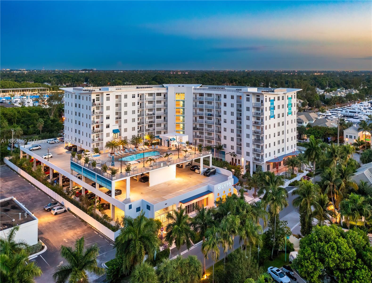 Welcome to ELYPS, where designed perfection from the top of the indoor/outdoor Sunset Lounge which overlooks the river and features a wet bar, coffee station and table games. Swooping down to a third-floor rooftop resort-style pool which features a barbecue area and wet bar. The building also has a well equipped fitness and cardio center, a Yoga room, indoor bike storage, a pet wash room and electric car charging. Beautifully refined finishes and carefully crafted floor plans, there's nothing quite like ELYPS - the water, the neighborhood, the convenience -the place to embrace modern living and a view of paradise.