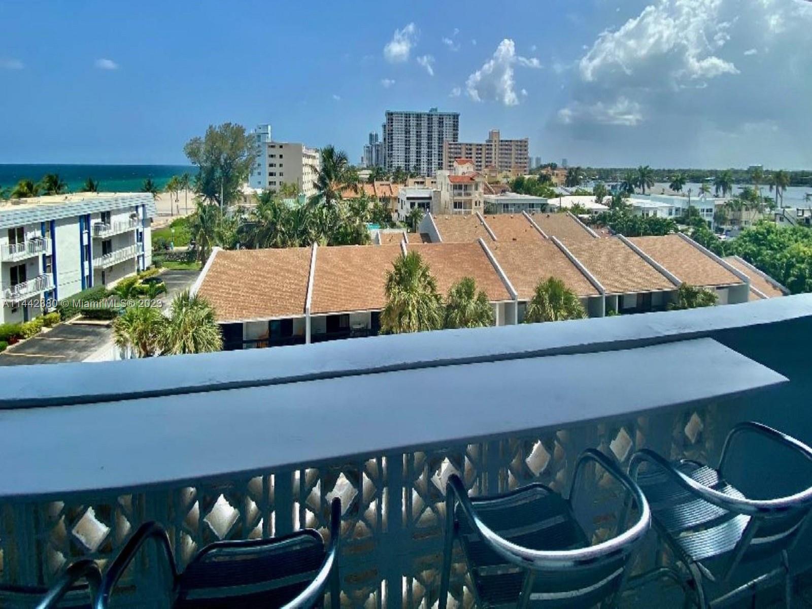 Best price on the Broadwalk, lowest HOA! Ocean, canal and city lights views combined in one phenomenal display from your 200+ sq.ft. private patio. Ocean views from all other rooms. Right on Hollywood Broadwalk: a stroll to restaurants and live concerts, but residential area of it: perfect balance of fun and tranquility. This boutique building is already completing its full renovation-something that others are facing: concrete restoration, new exterior colors, new hurricane proof windows/doors, roof top pool with smashing views to be open soon. ALL ASSESSMENTS PAID. Freshly painted apartment with tile/wood like plank floors. Tons of storage (2 walk-in closets in main bedroom). Garage parking. Rental policy appealing to full time residents and investors: rent right away for 180 days min.