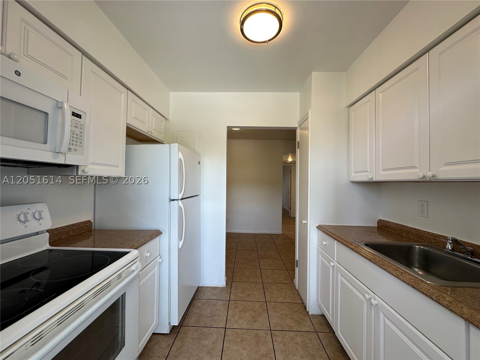 Beautiful, SPACIOUS 2 bedroom/ 2 bathroom apartment in Isles of Coral Ridge, centrally located in Ft. Lauderdale. Less than 20 min to the beach! Unit has renovated bathrooms, updated flooring, lighting, and a charming kitchen with stainless steel appliances. 3rd floor unit with impact windows, central AC, and walk-in closets. Also includes 2 assigned parking spaces! Building has an elevator, on-site laundry room, a grass area with a sundeck on the water, and ample parking. Property is well maintained with beautiful grounds. Water, sewer, trash removal, AC and maintenance included. Renter responsible for electric and internet. No smoking allowed! Pets welcome!