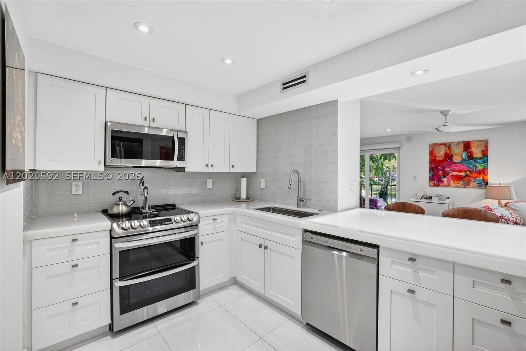 Welcome to Top of the Mile and this ultra renovated 1st floor, 2 bed, 2 bath condo on A1A. Prime location, 1 block from the sand in Lauderdale-by-the-sea, across the street from restaurants, shops, grocery. No expense spared, Fully renovated designer kitchen w/ Ash white glass Crystal countertops w/ Lumiron LED backlighting, new LG Appliances (2021), wine fridge. Porcelain Floors, Hunter Douglas windows Treatments, Smooth ceilings, renovated Baths, LED mirrors. All Impact windows & doors, washer & Dryer in unit, a gorgeous sleek modern condo for you. AC (2018), Water heater (2021) 40 year & Concrete restoration complete, budget has reserves, great for full time residents, snowbirds, beach lovers, can rent once per year for income while you are not using it too. Secure Garage & Building, custom $4k storage unit, only 64 units. Updated Fitness center & pool. All ages welcome. Conventional Financing available. 2nd bed was opened up to make a large living space with wide open floor plan perfect for office / loft style, can easily be converted back.