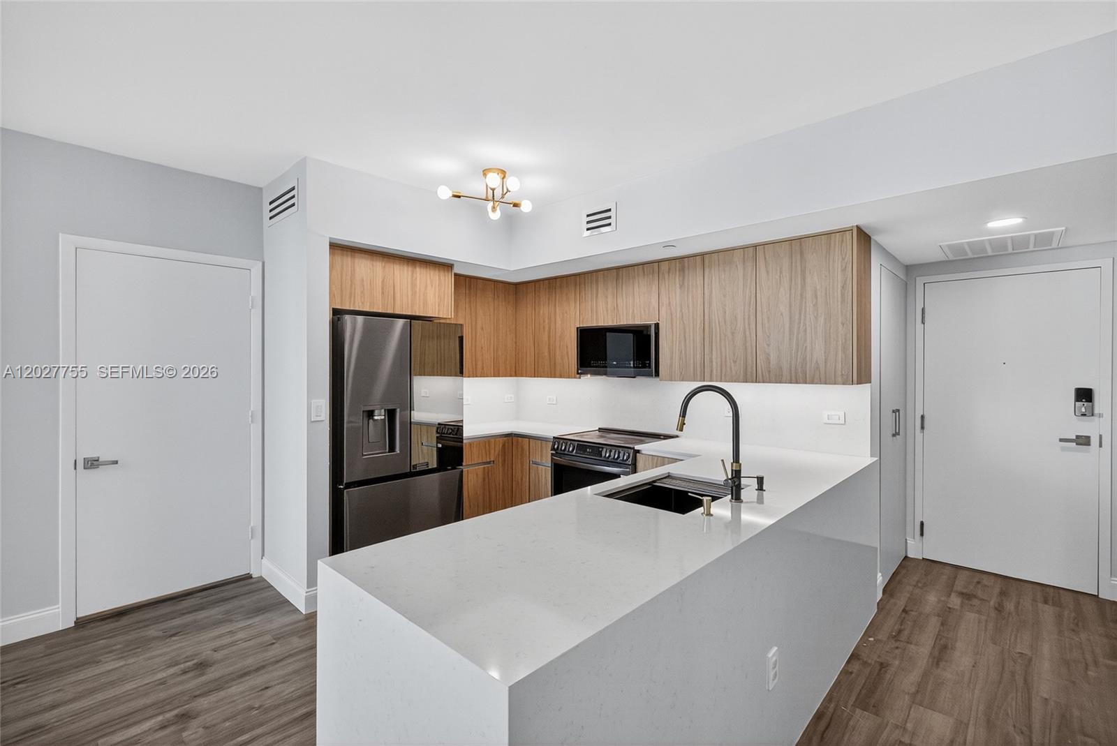 Spacious and bright 2 bed / 2 bath plus den, perfect as a 3rd bedroom or office. Located in the desirable Wind Condo at Neo, this unit features an open kitchen with S/S appliances, granite countertops, marble bathrooms, in-unit washer & dryer, and a private balcony with views of Downtown Miami. Resort-style amenities include a pool, jacuzzi, spa, sauna, steam room, indoor racquetball court, full gym, EV chargers, game room, movie theater, kids’ play area, and two-story party room. walking distance to Brickell City Centre, Mary Brickell Village, restaurants, shops, nightlife, and easy access to I-95. High-rise luxury living in the heart of Brickell, The unit is being listed unfurnished.