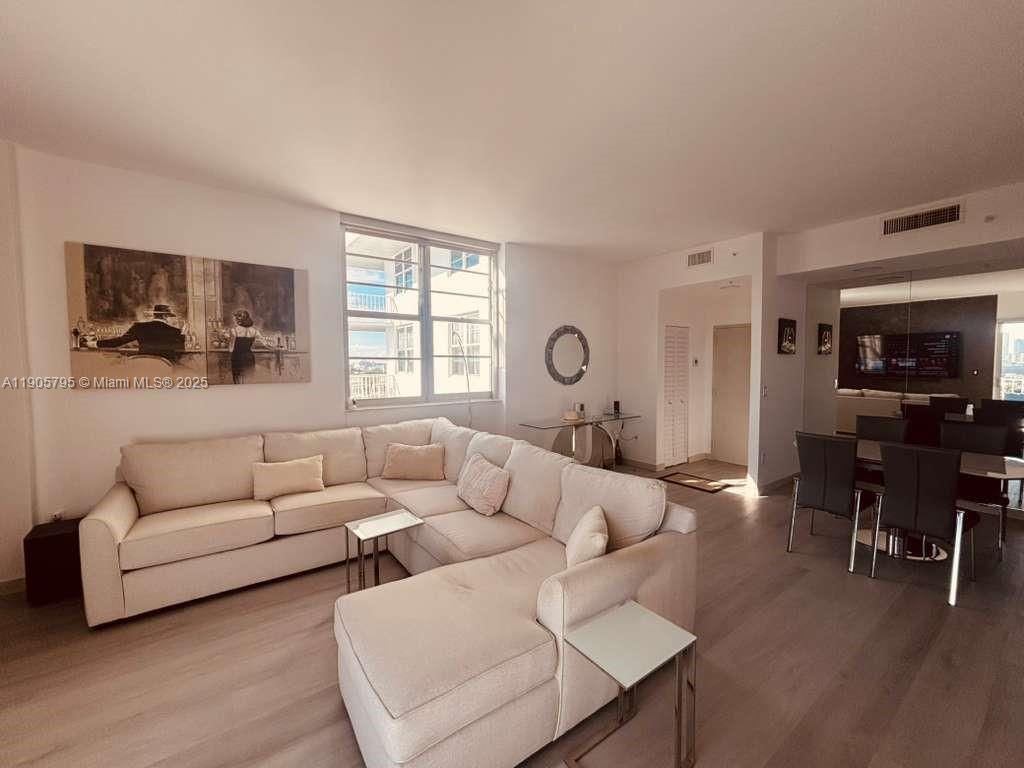 Magnificent Corner Unit on the 14th Floor. One Block from the Beach in the Prestigious Faena District
This exceptional 1bed and 1.5 bath unit features 10-foot ceilings throughout and the wrap around shaped terrace in the building. Stainless steel appliances, wood flooring, and stunning views of the Intracoastal Waterway, canal, and South Beach. Blackout shades, surround stereo system and two big screen TVs (85" and 55") included with the sale.
Enjoy a full suite of amenities, including a pool, gym, sauna, assigned covered parking, and premium cable channels. High-speed internet (Wi-Fi) is also included in the maintenance. Special Assessment paid in full.