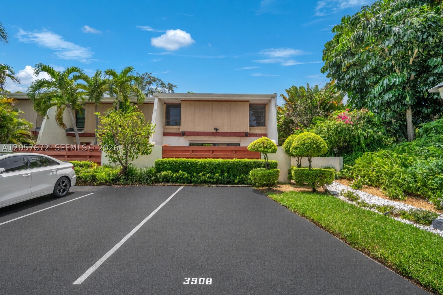 Beautifully updated 3-bedroom, 2.5-bath corner townhouse offering 1,850 sq. ft. in the highly desirable Lakes of Emerald Hills. One of the most sought-after locations in the community, this home offers added privacy, abundant natural light, and beautifully redone front and rear patios with a spacious deck perfect for entertaining. Inside, enjoy porcelain floors, custom wood cabinetry, granite countertops, under-cabinet lighting, generous pantry storage, a wall oven, new refrigerator, and a breakfast bar with seating. The upstairs family/media room provides flexible additional living space, while modern cable-wire railings and a speaker system throughout the interior and both patios complete the home. Additional features include a 5-ton Carrier A/C, updated water heater, brand-new LG dryer, exterior sensor lighting, Ring cameras, and a Honda generator. Pet-friendly community with three pools, a large park, playground, dog park, and 24-hour security. Conveniently located near houses of worship, schools, shopping, dining, I-95, FLL Airport, and the Hard Rock.