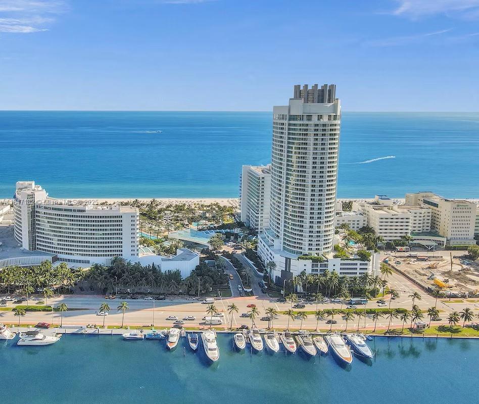 Experience elevated oceanfront living in this exquisite 2-bedroom, 3-bath corner residence on the 23rd floor of the iconic Fontainebleau II. Fully furnished and beautifully appointed, this elegant unit features a private foyer entrance, marble floors, a full kitchen, in-unit washer/dryer, and three private balconies showcasing panoramic views of the Atlantic Ocean, Biscayne Bay, and Miami’s skyline. Set on 22 acres of prime oceanfront, Fontainebleau II offers world-class amenities including award-winning restaurants, LIV nightclub, Lapis spa, and a state-of-the-art fitness center. Maintenance includes A/C, electricity, valet, and daily breakfast in the exclusive owners’ lounge. A seamless blend of luxury, comfort, and the vibrant Miami Beach lifestyle.