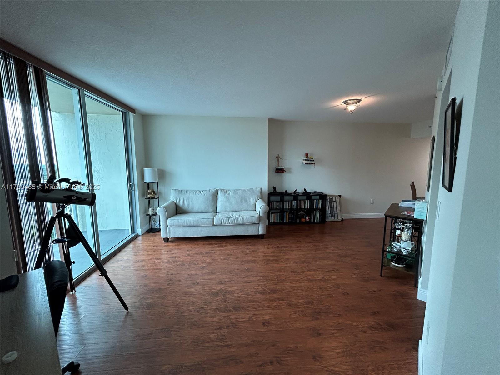 Absolutely lovely unit with unobstructed views stretching over Pinecrest to Biscayne Bay! Light-filled open master with walk-in closet. Bright European kitchen with solid wood cabinets, granite counters, and stainless steel appliances. Includes 1 assigned space + complimentary valet for 2nd car. Prime location—steps to Dadeland Mall, Metrorail, dining, and Publix, with quick access to US-1 & Palmetto. Full amenities: gym, 2 pools, concierge, security, free cable, internet, water, and garbage. Price is negotiable to offset upcoming special assessments—opportunity to buy smart.