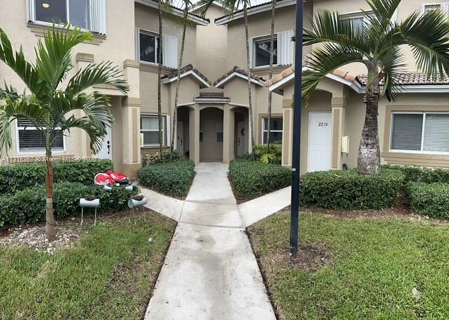 Great 2 bedroom, 2.5 bath two story townhome available in the desirable neighborhood of Towngate at Keys Gate. This established community includes a guard at the gate, 24 hour roving security, community pool, playground, tennis, racquetball and pickle ball courts, internet and cable. The inside of this condo features granite counters in the kitchen, tiled first floor, laminate on stairs and second floor, impact french doors leading to a great fenced in yard perfect for entertaining, impact windows throughout, each bedroom has its own bathroom, and much more.