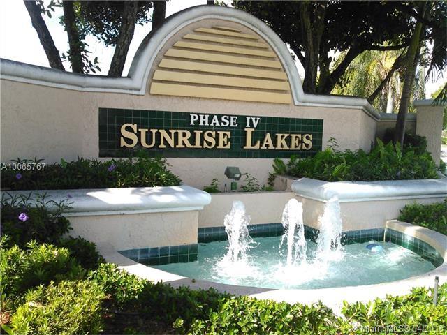 Located in the most exclusive, gated 55+ community of beautiful Sunrise Lakes Golf Condominium (Phase 4). Spacious 2 BR/2 Bath, 1245 SF, washer/dryer, enclosed Florida Room. Enjoy breathtaking water views, golf, tennis, swimming, state-of-the-art fitness center, extremely active clubhouse with live entertainment, shows, dancing, dinner parties, movie nights, Yoga, Zumba, golf, tennis and courtesy bus all included monthly maintenance.
