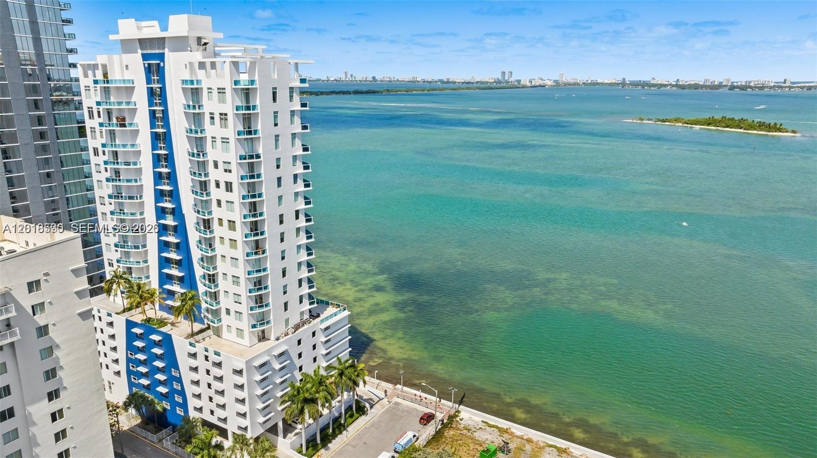 Rarely available, Luxury waterfront PENTHOUSE, 12'ceiling height,  with spectacular direct and unobstructed views of Biscayne Bay, the Ocean, Miami Beach and beyond, this SE CORNER unit offers 2 Beds / 2 Baths + DEN, 2 cover- assigned parking space, extra-large terrace perfect for entertaining, plus 2 additional balconies. Floor to ceiling impact resistant windows and sliding doors. This Kobi Karp Designed BOUTIQUE Building offers a bayside Pool with BBQ, Sunset Terrace, Gym overlooking the bay and 24-hr Concierge/ Security. Excellent location with easy access to Miami Beach, Downtown, Brickell, Wynwood, Design District and Miami International Airport. Truly a fantastic place .
