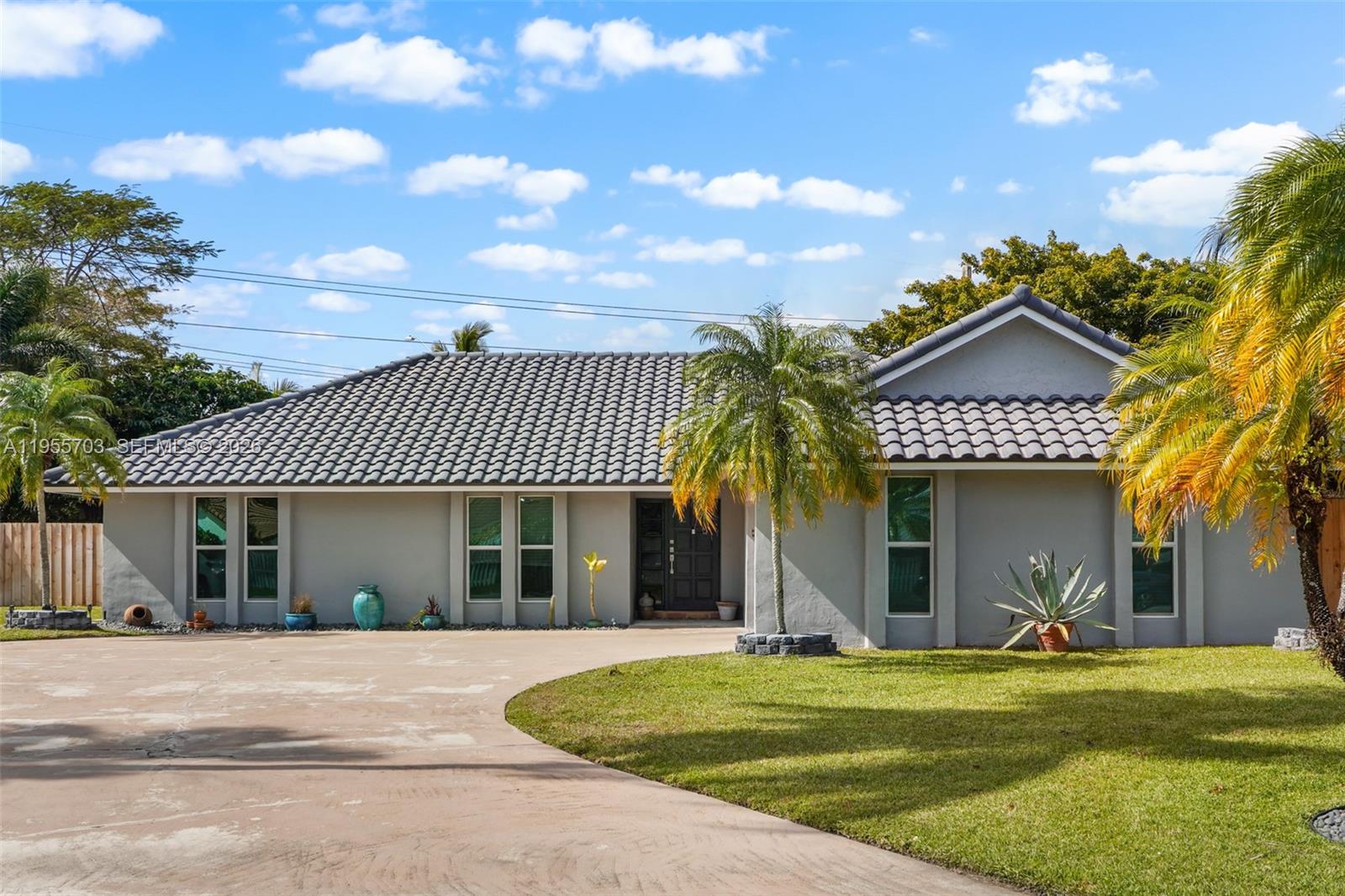 Beautifully situated on nearly half an acre in the highly desirable Boca Del Mar area, this spacious single-story home offers exceptional privacy, an open layout, and a relaxing indoor-outdoor lifestyle. Featuring 4 bedrooms, 3 baths, and over 2,200 sq ft of living space, the property includes an open floor plan, central cooling, and a large patio overlooking a serene backyard with an inviting pool. The oversized lot, mature landscaping, create a peaceful retreat while still being minutes from top-rated schools, shopping, dining, and Boca’s best amenities. A rare opportunity to own a generously sized home on one of the largest lots in the neighborhood—perfect for updating to your personal style or enjoying as-is. TWO HOMEOWNERS ASSOCIATION COMMUNITY $175 QTRLY  AND MASTER $181 annually
